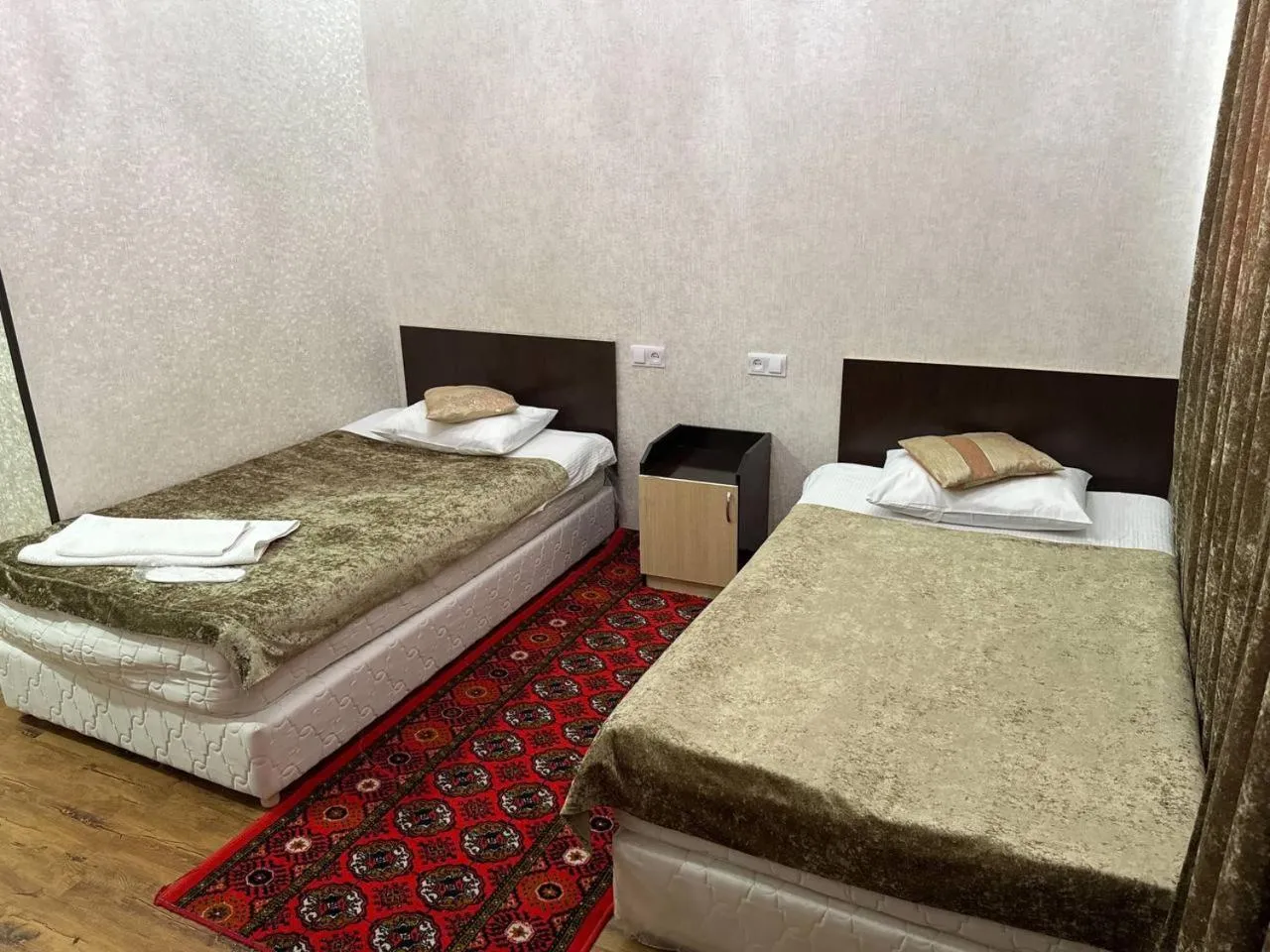 Bed in RATMINA HOTEL