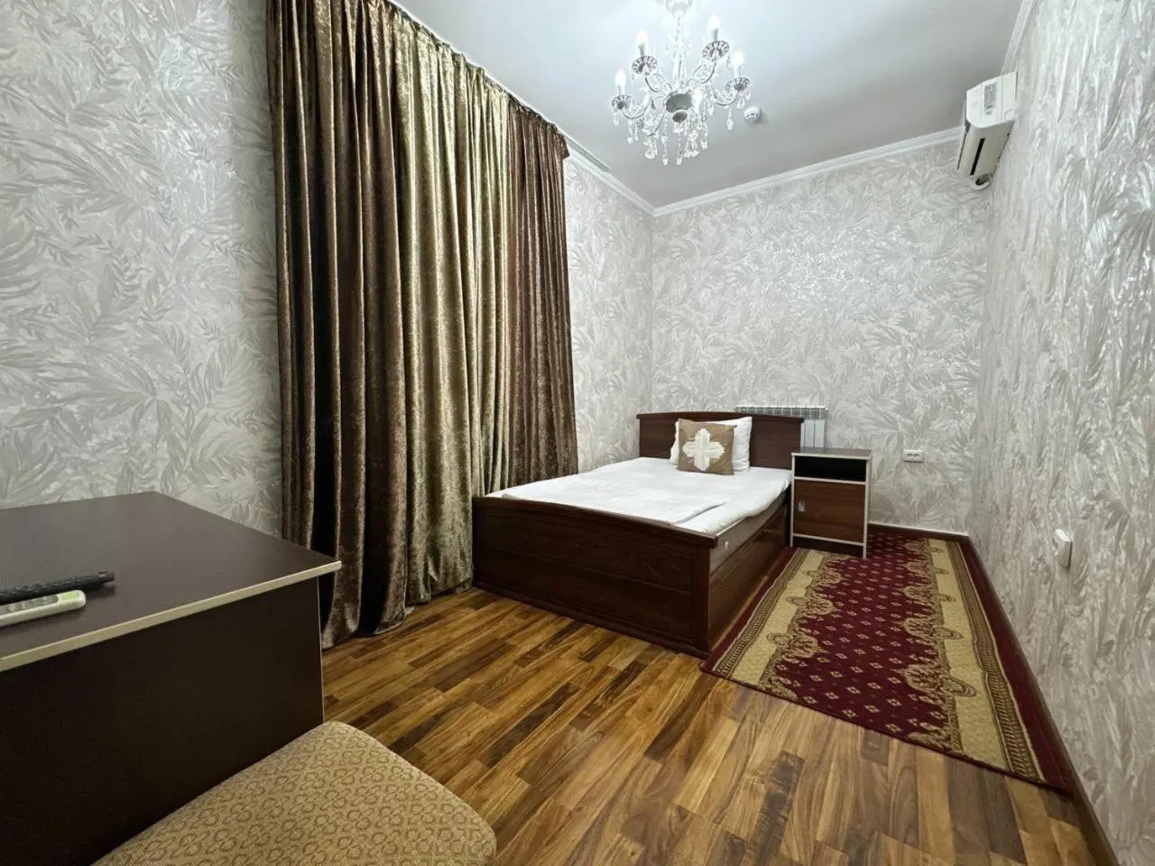 Bed in RATMINA HOTEL