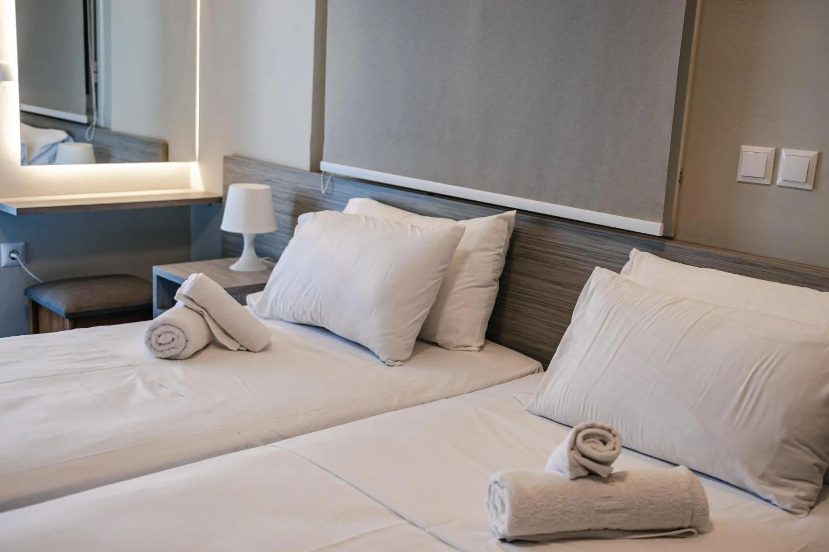 Bed in Mesogeios Hotel