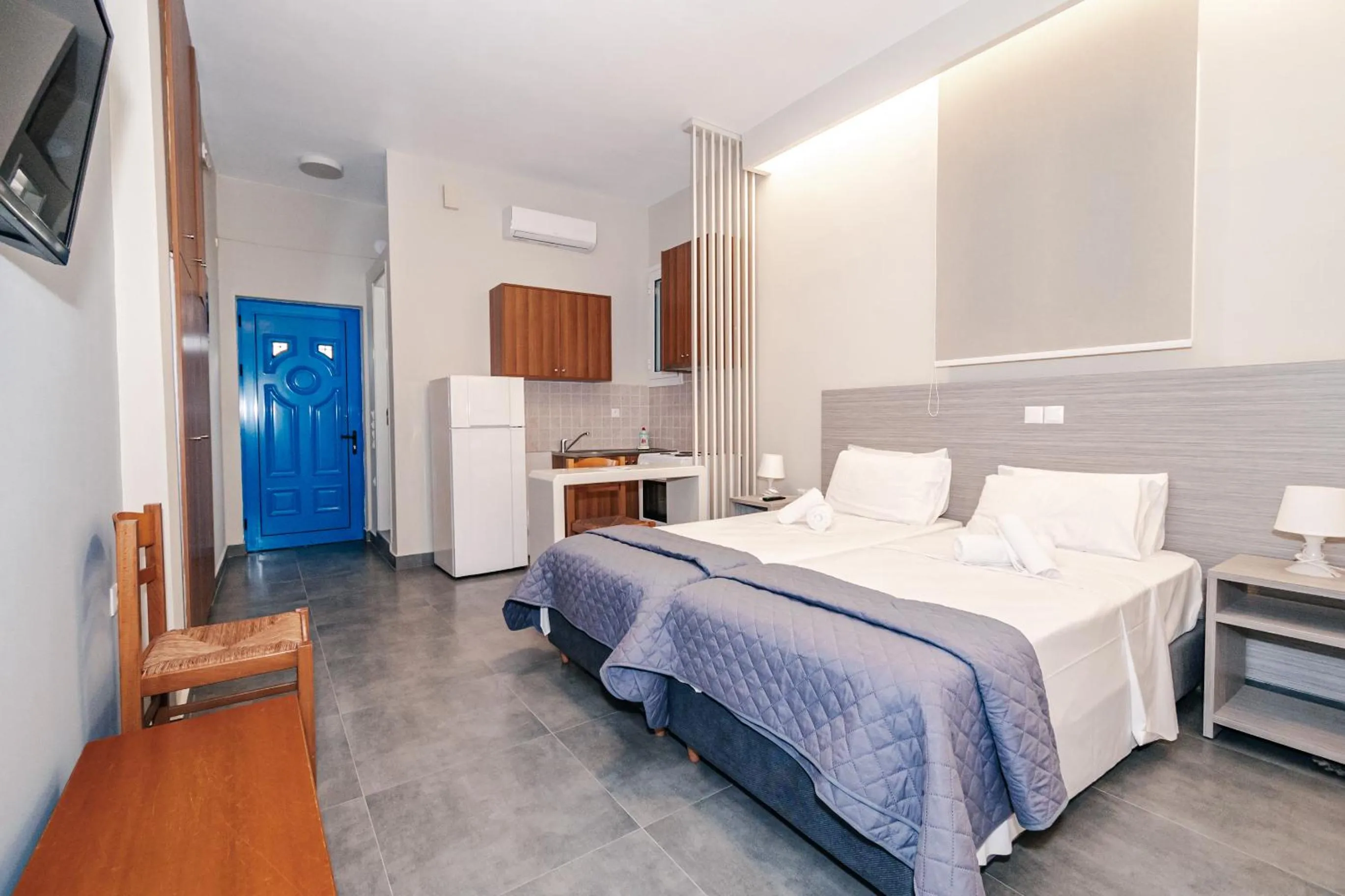 Bed in Mesogeios Hotel