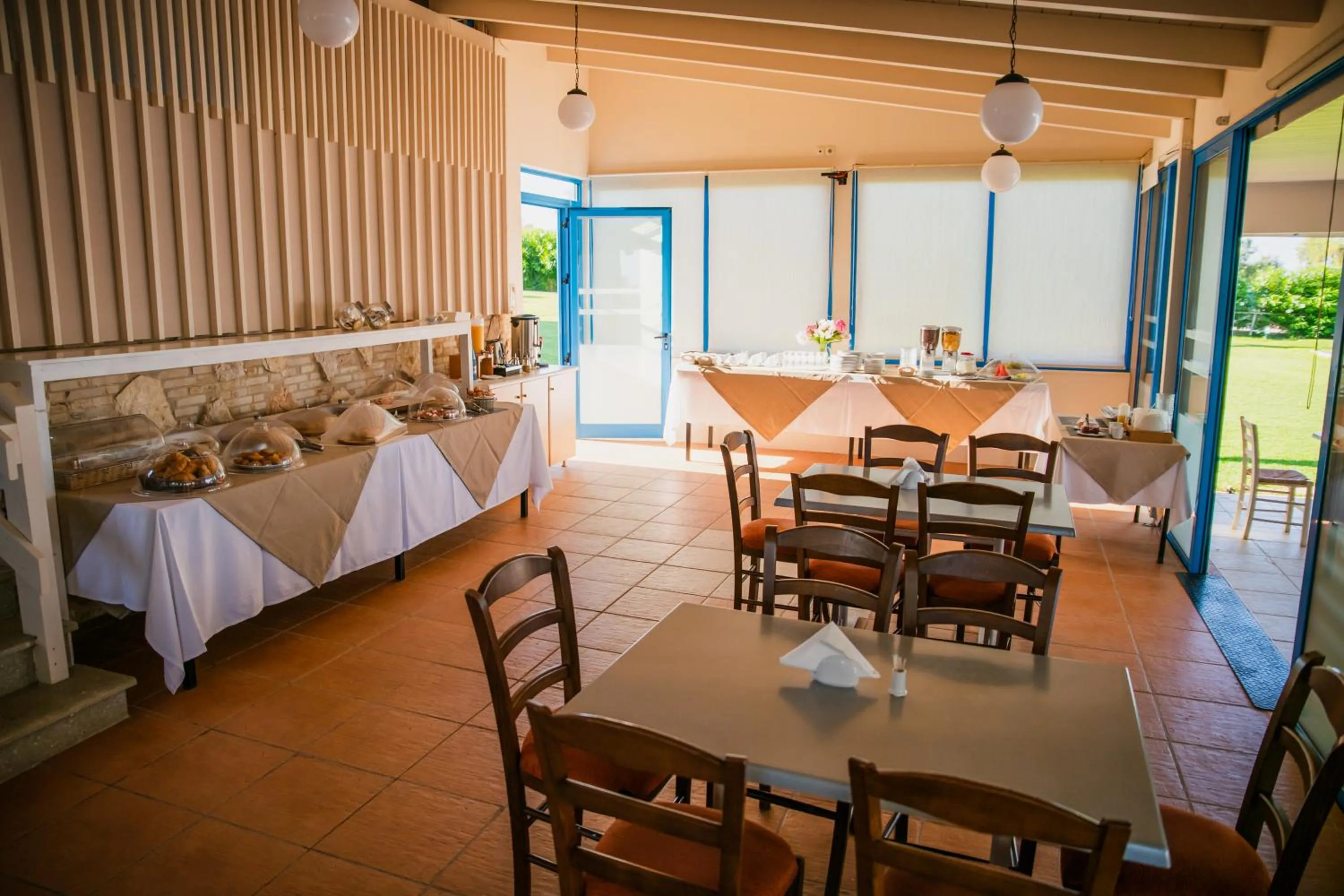 Dining area in Mesogeios Hotel