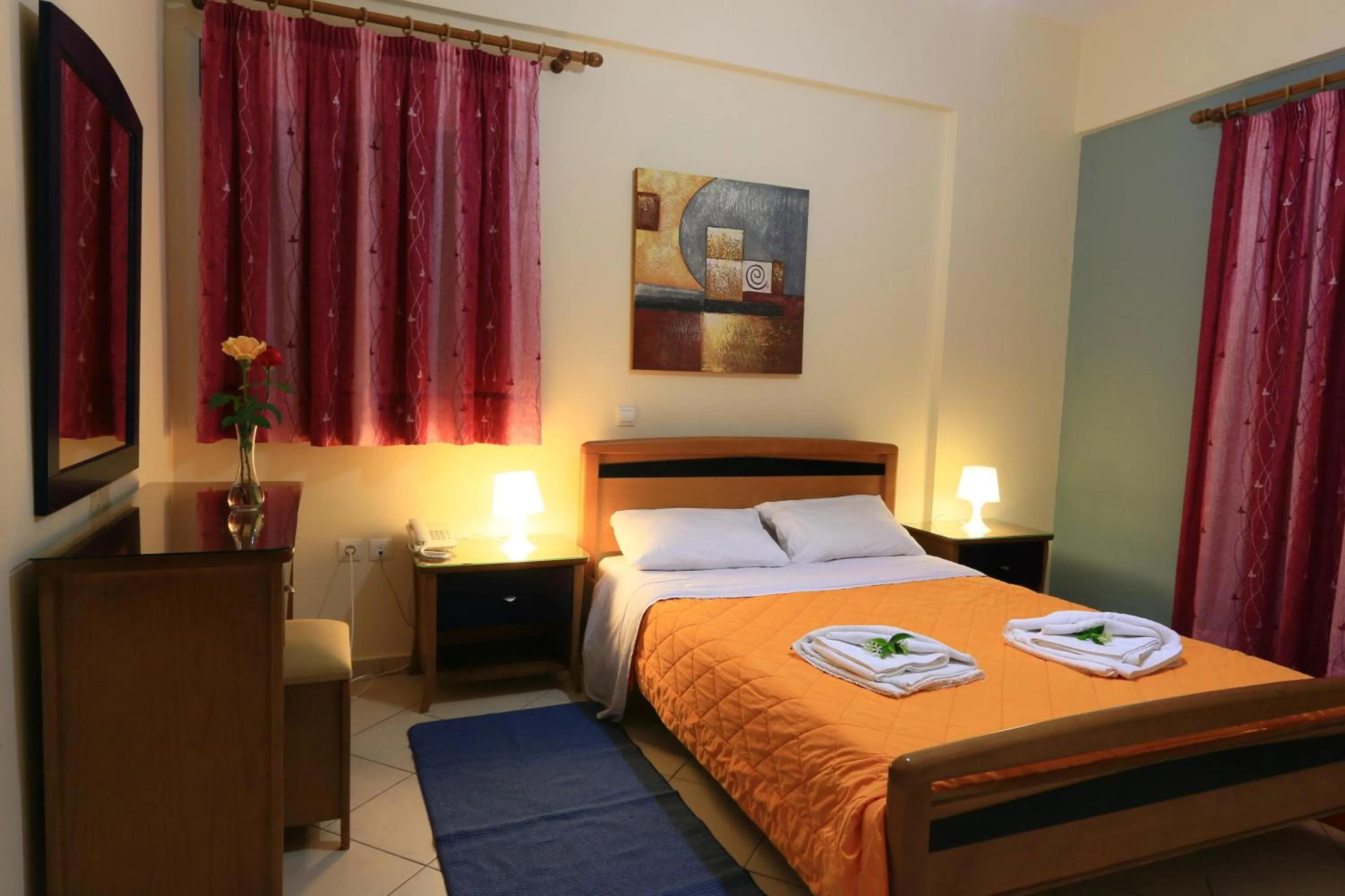 Bed in Mesogeios Hotel