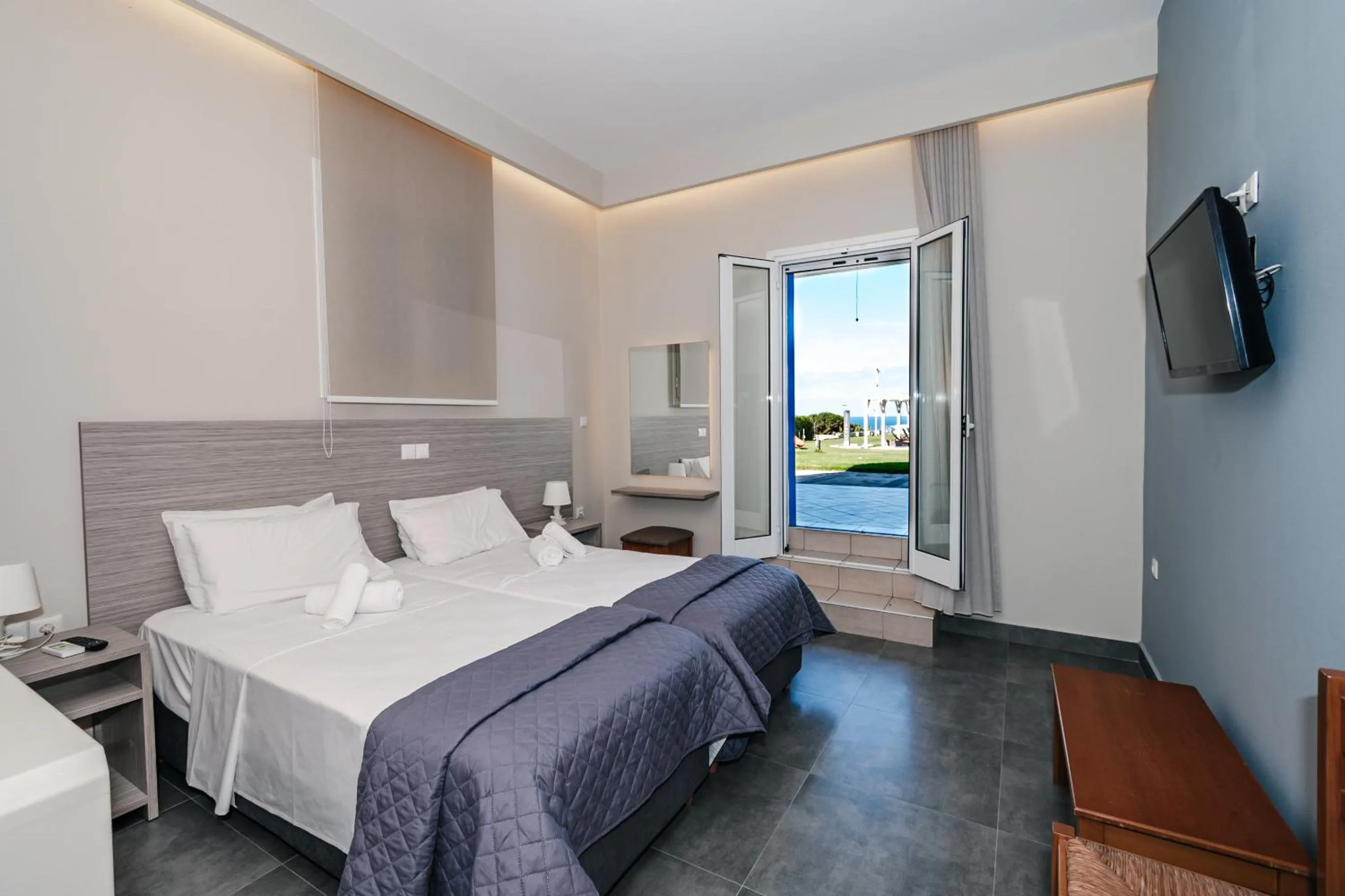 Bed in Mesogeios Hotel