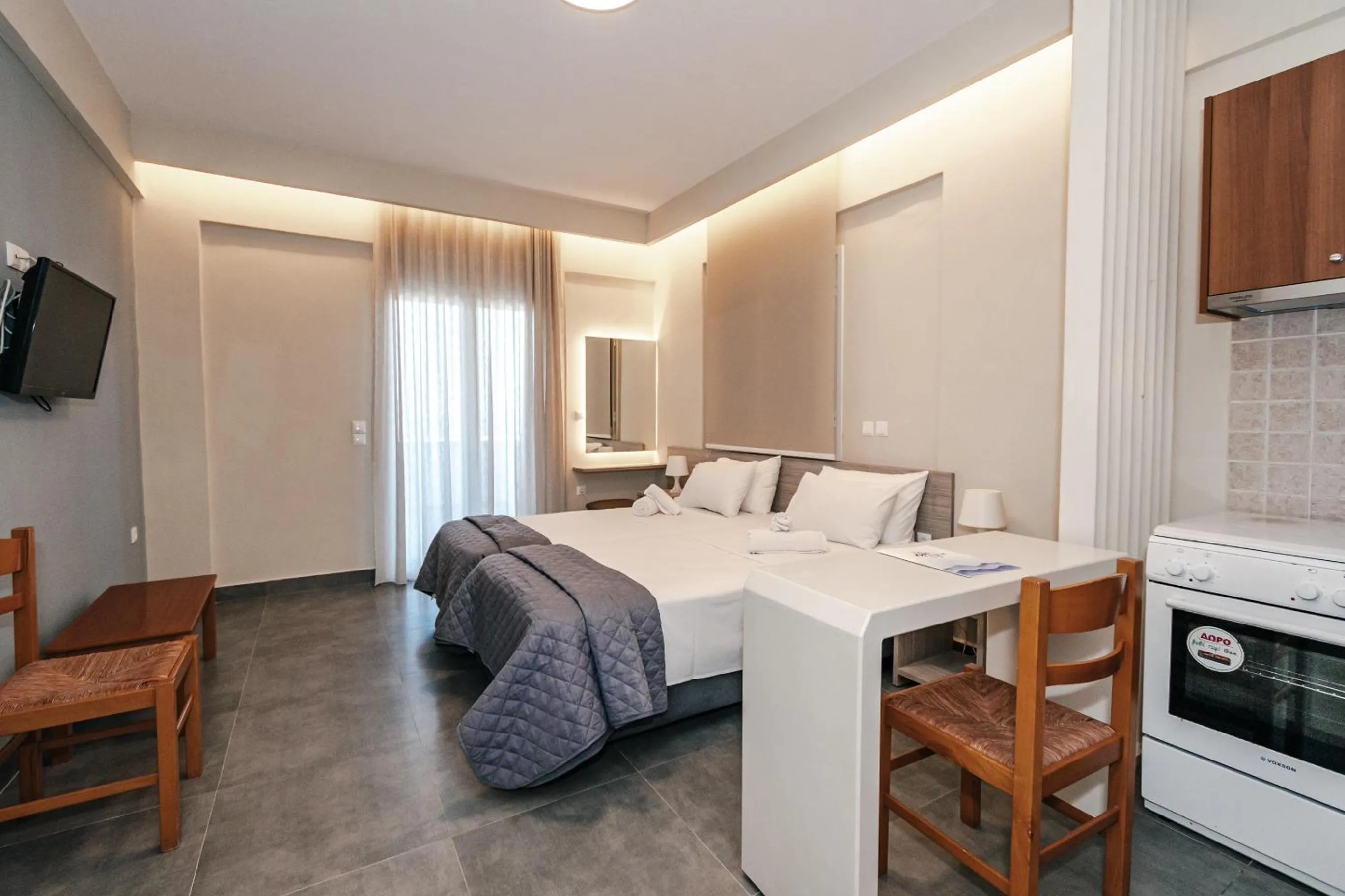 Bed in Mesogeios Hotel