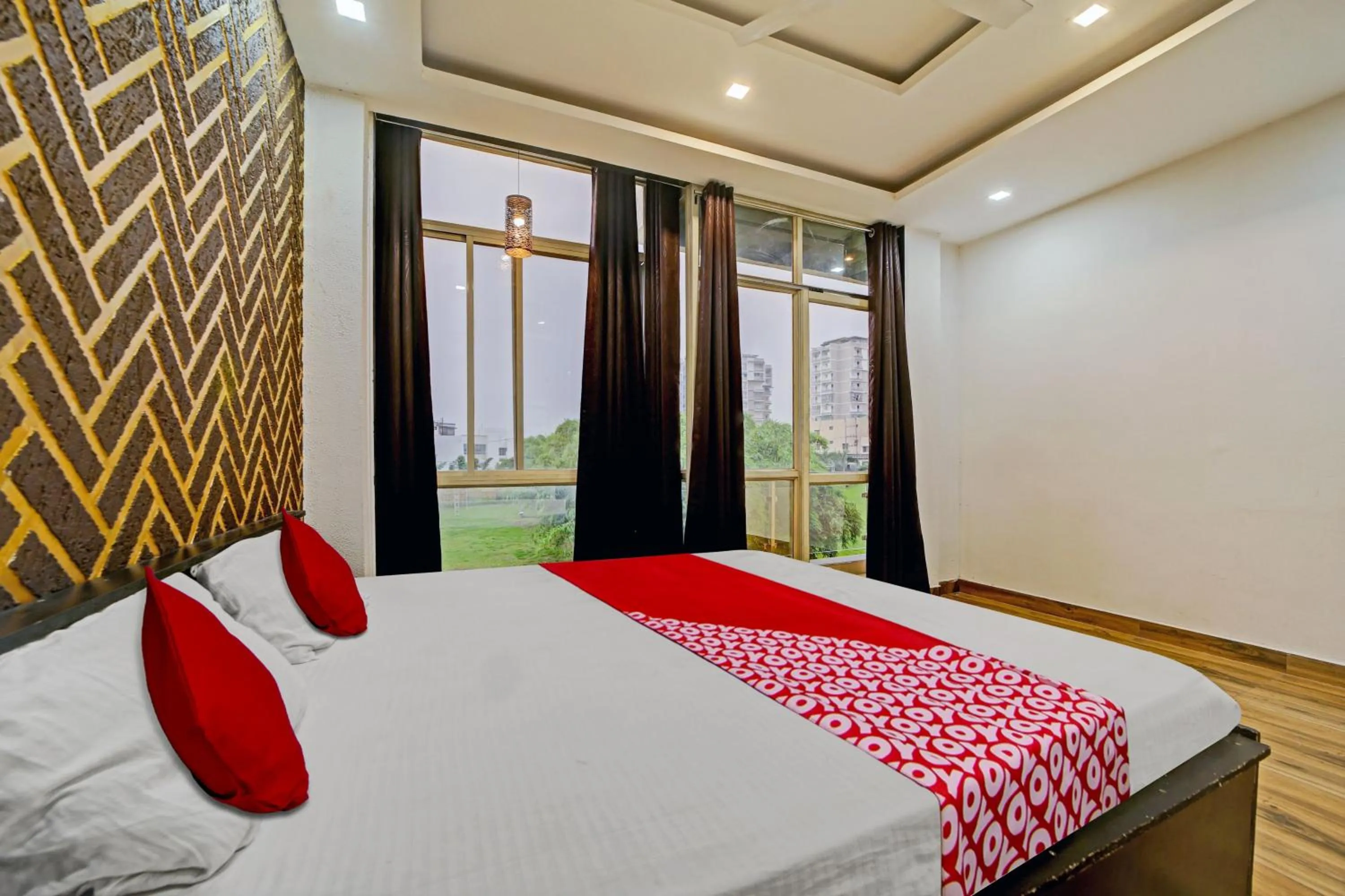 Bedroom, Bed in Super Hotel O Vachan Garden And Resort