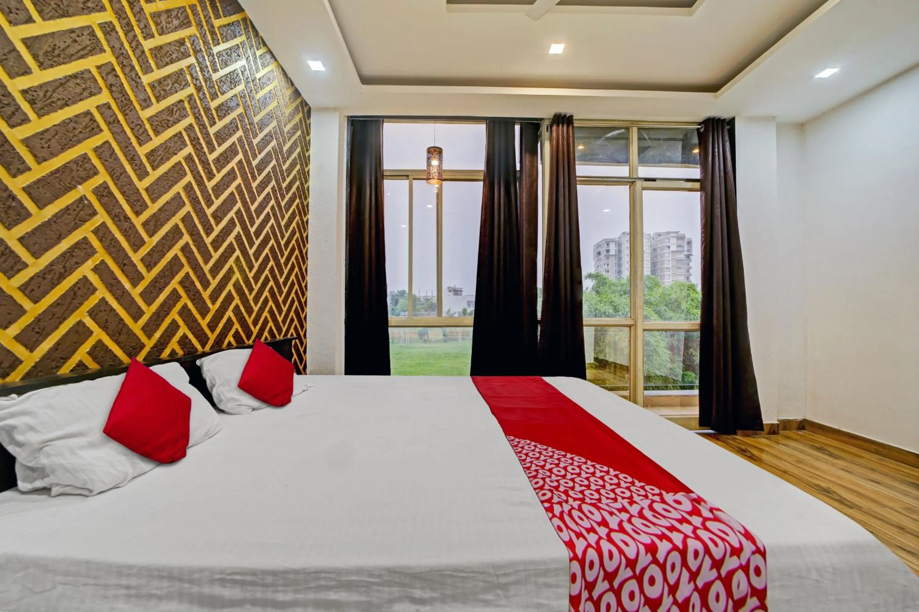 Bedroom, Bed in Super Hotel O Vachan Garden And Resort