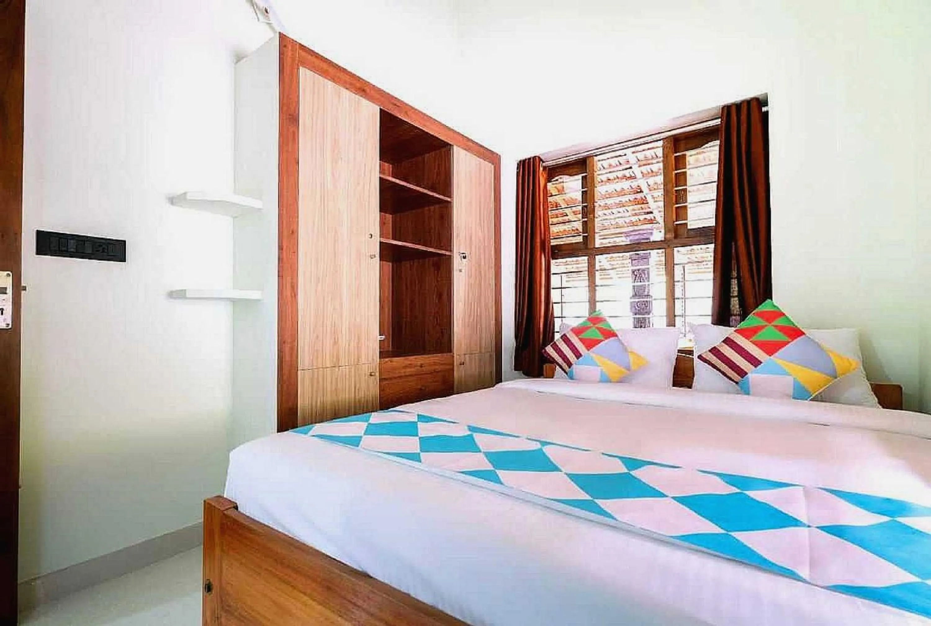 Bedroom in Hotel O ATHARVAM RESORT