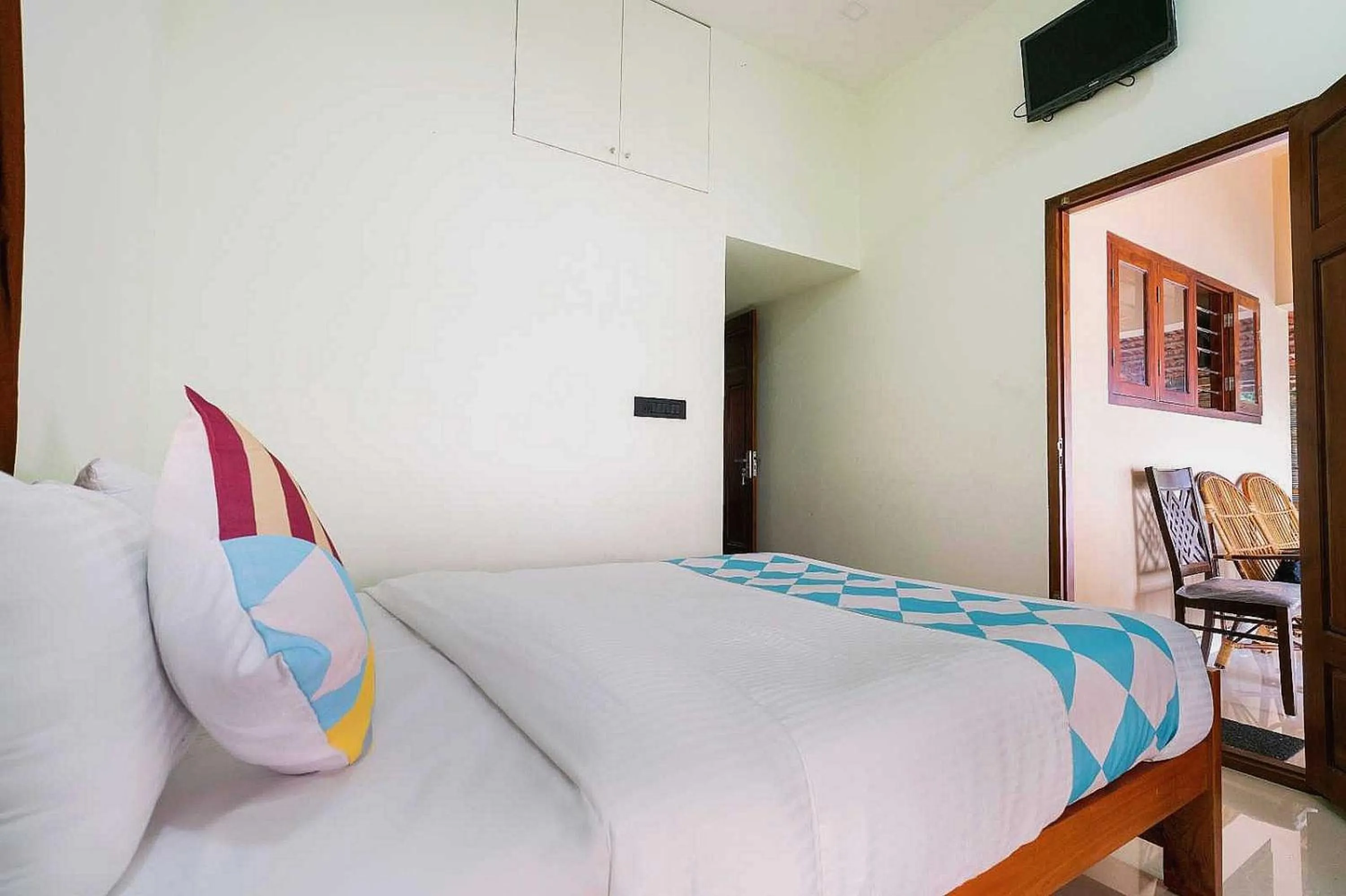 Bedroom in Hotel O ATHARVAM RESORT