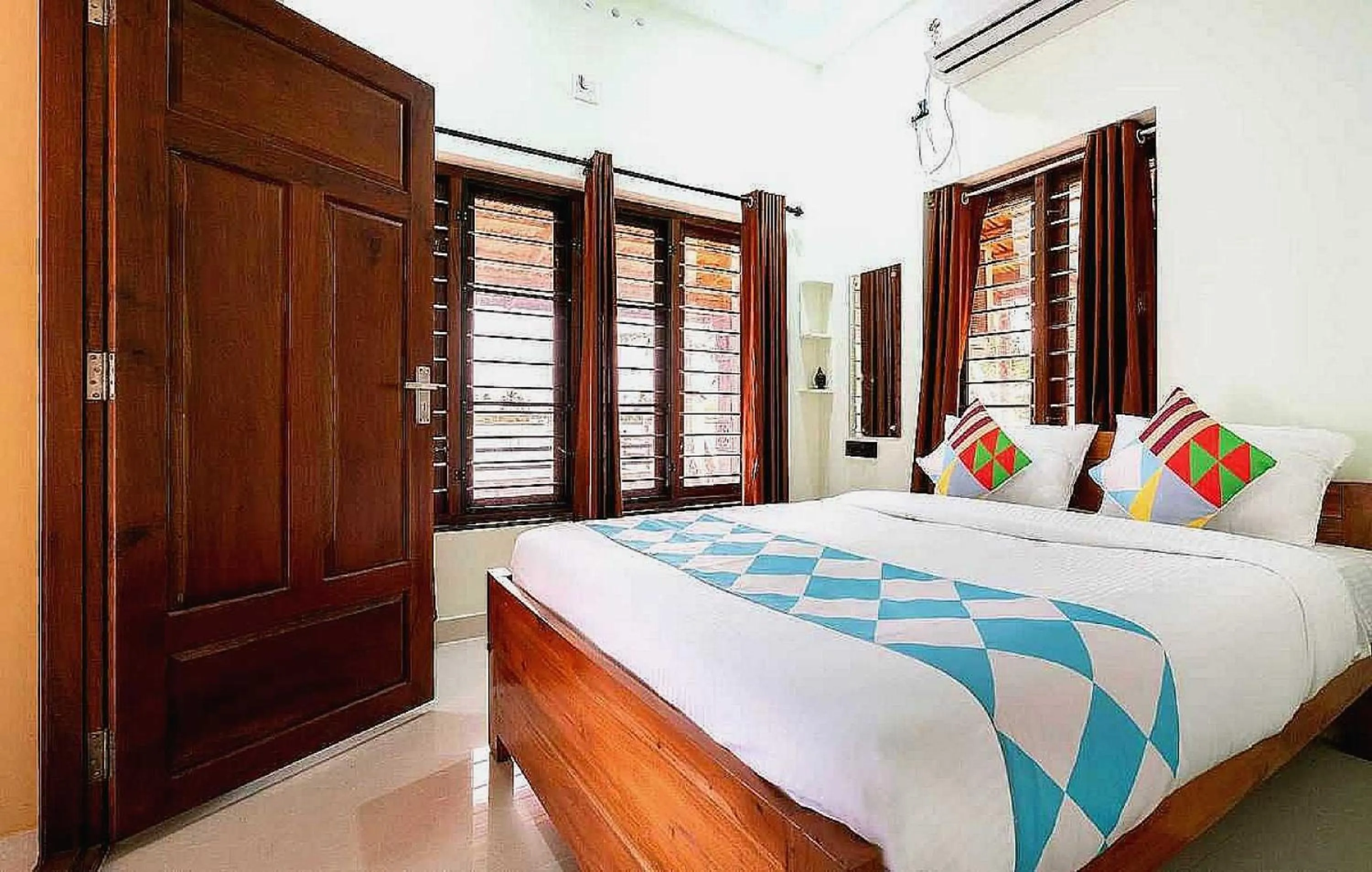 Bedroom in Hotel O ATHARVAM RESORT