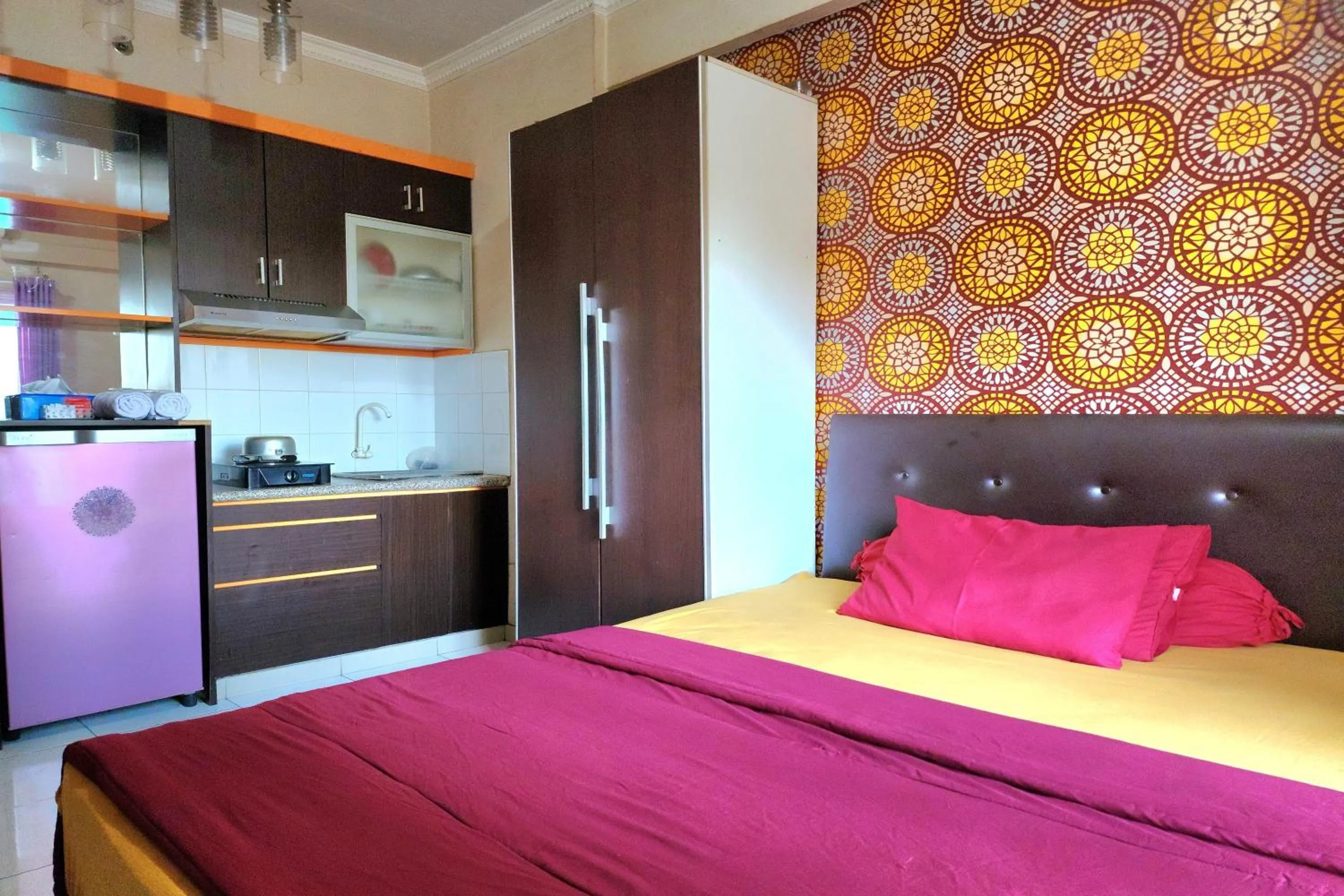 Bed in Queen Room 2 @ Grand Center Point Apartment