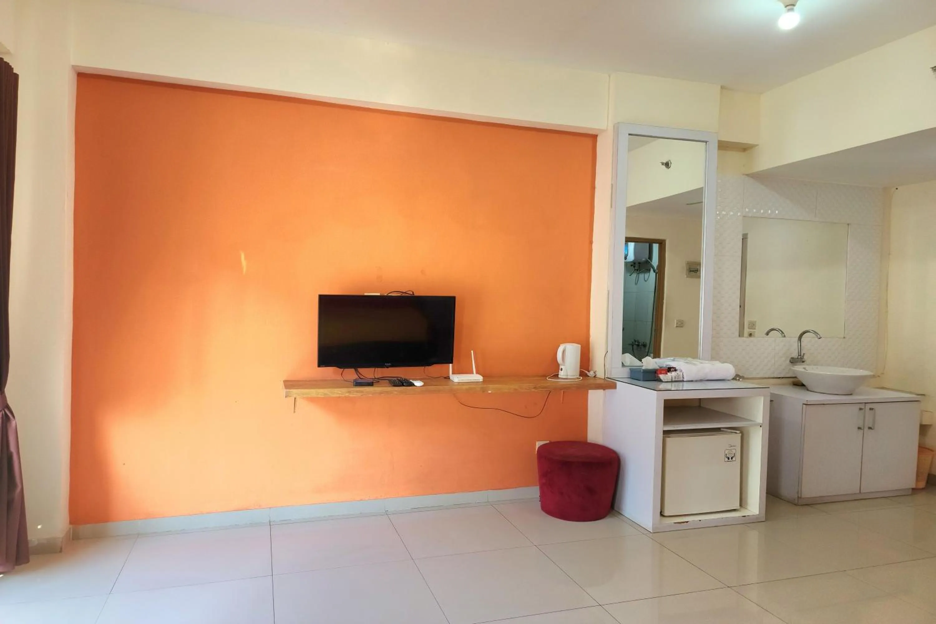 TV and multimedia in Queen Room 2 @ Grand Center Point Apartment