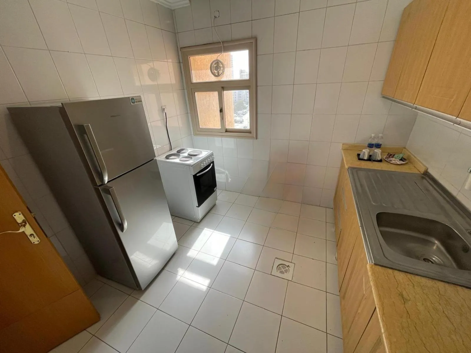 Kitchen or kitchenette in Terrace Furnished Apartments - Mahboula