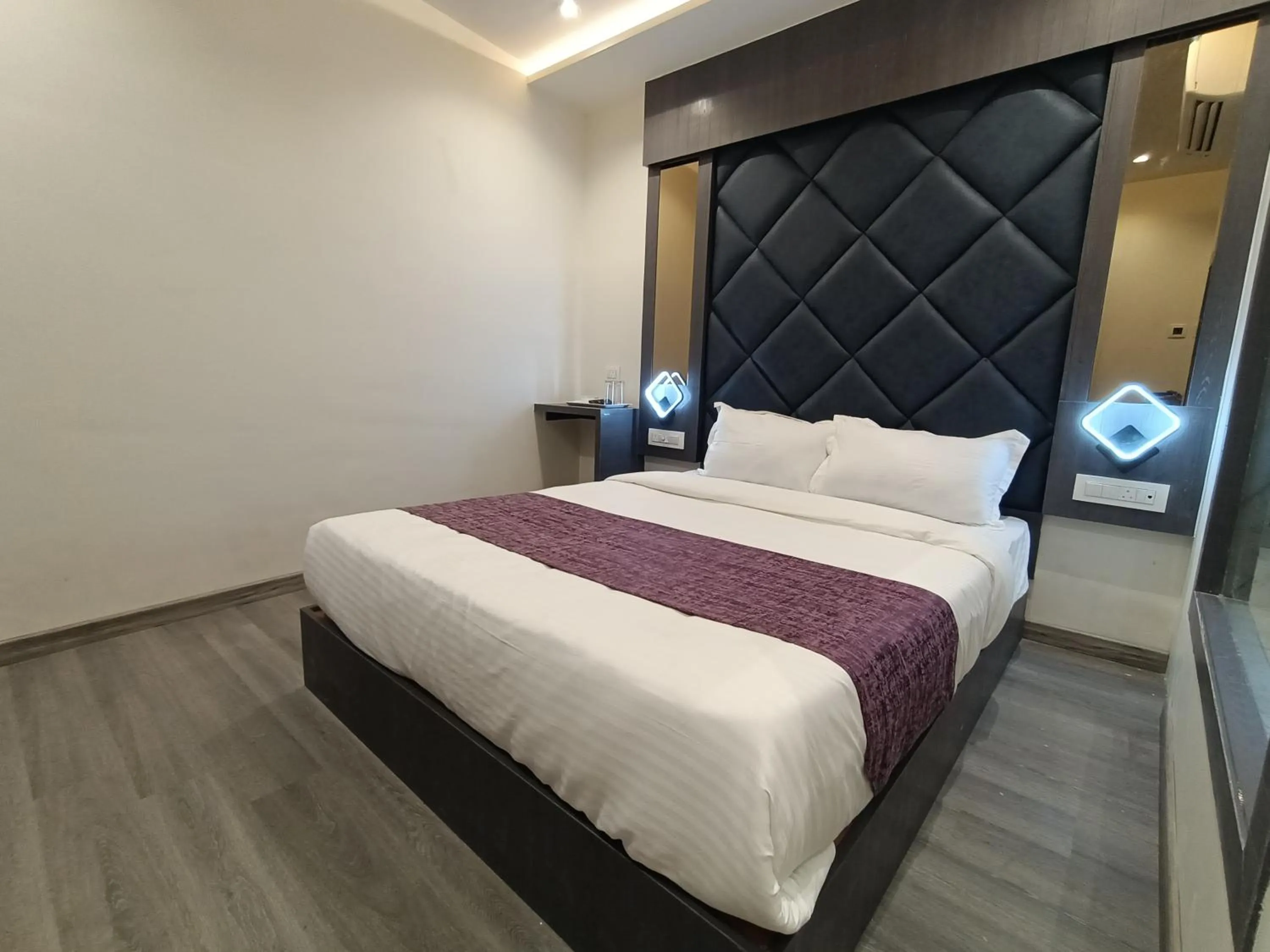 Bed in Hotel Classio Andheri - Near DN Nagar Metro Station
