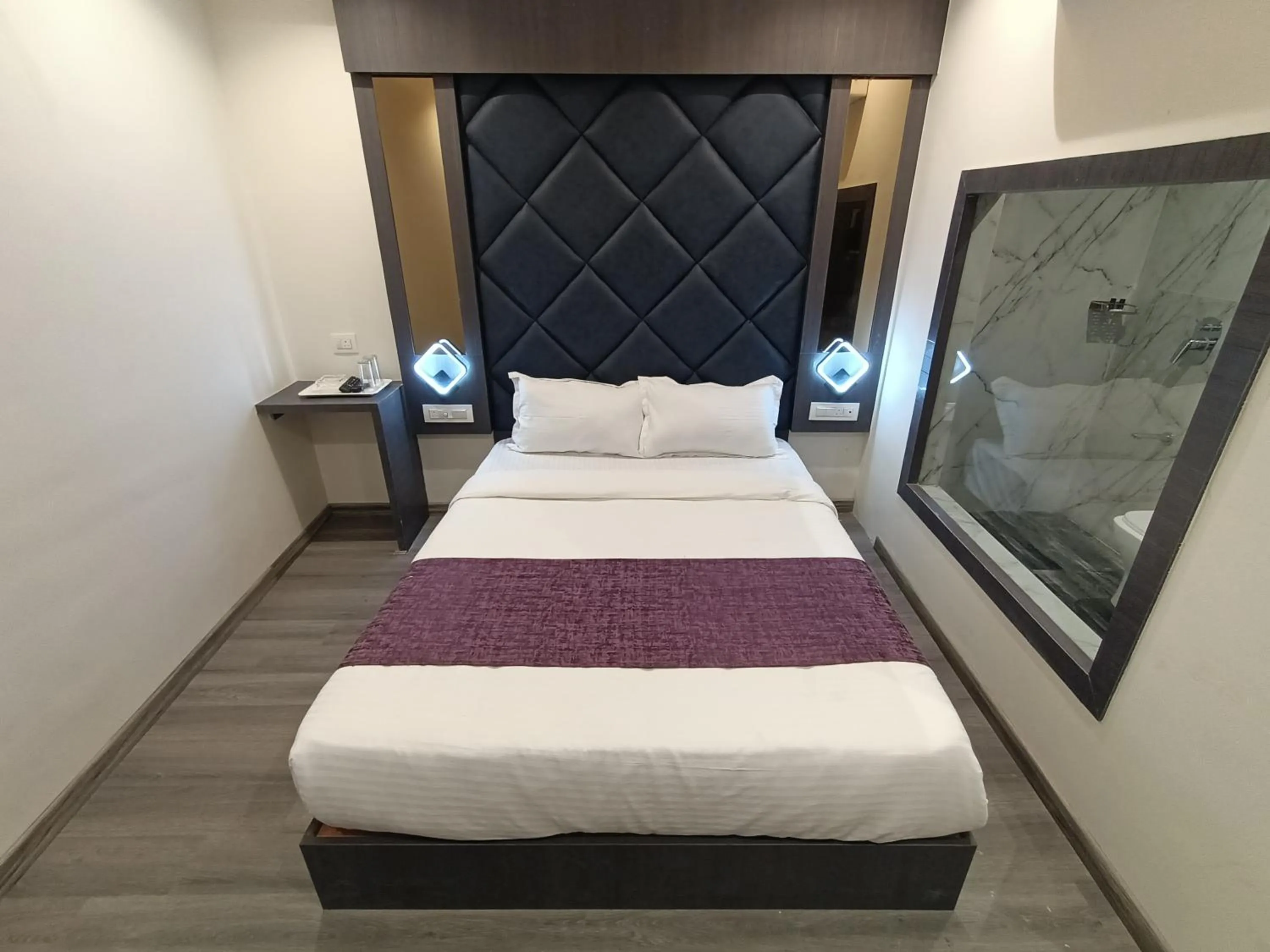 Bed in Hotel Classio Andheri - Near DN Nagar Metro Station