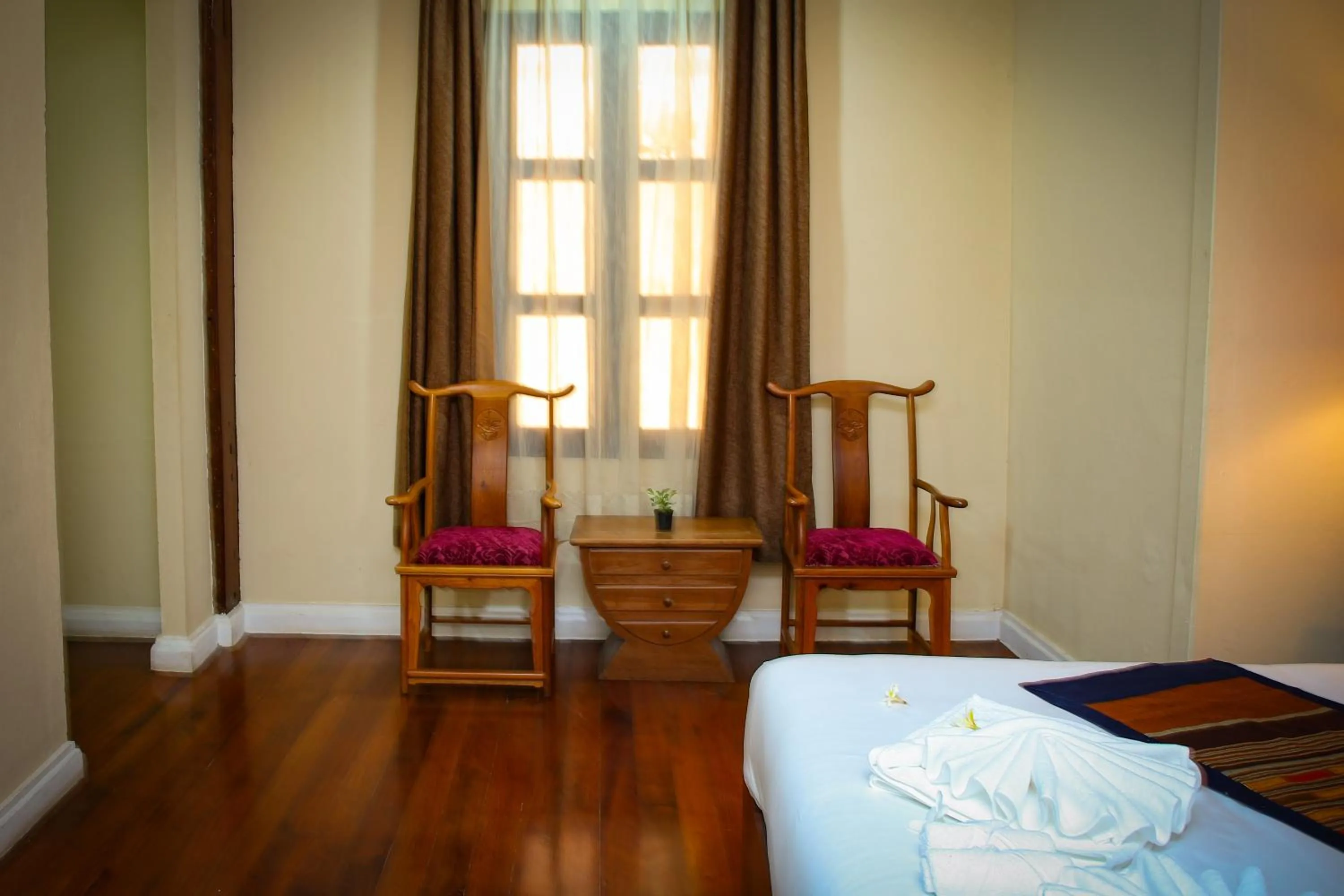 Bed in Le Luxe Boutique Hotel