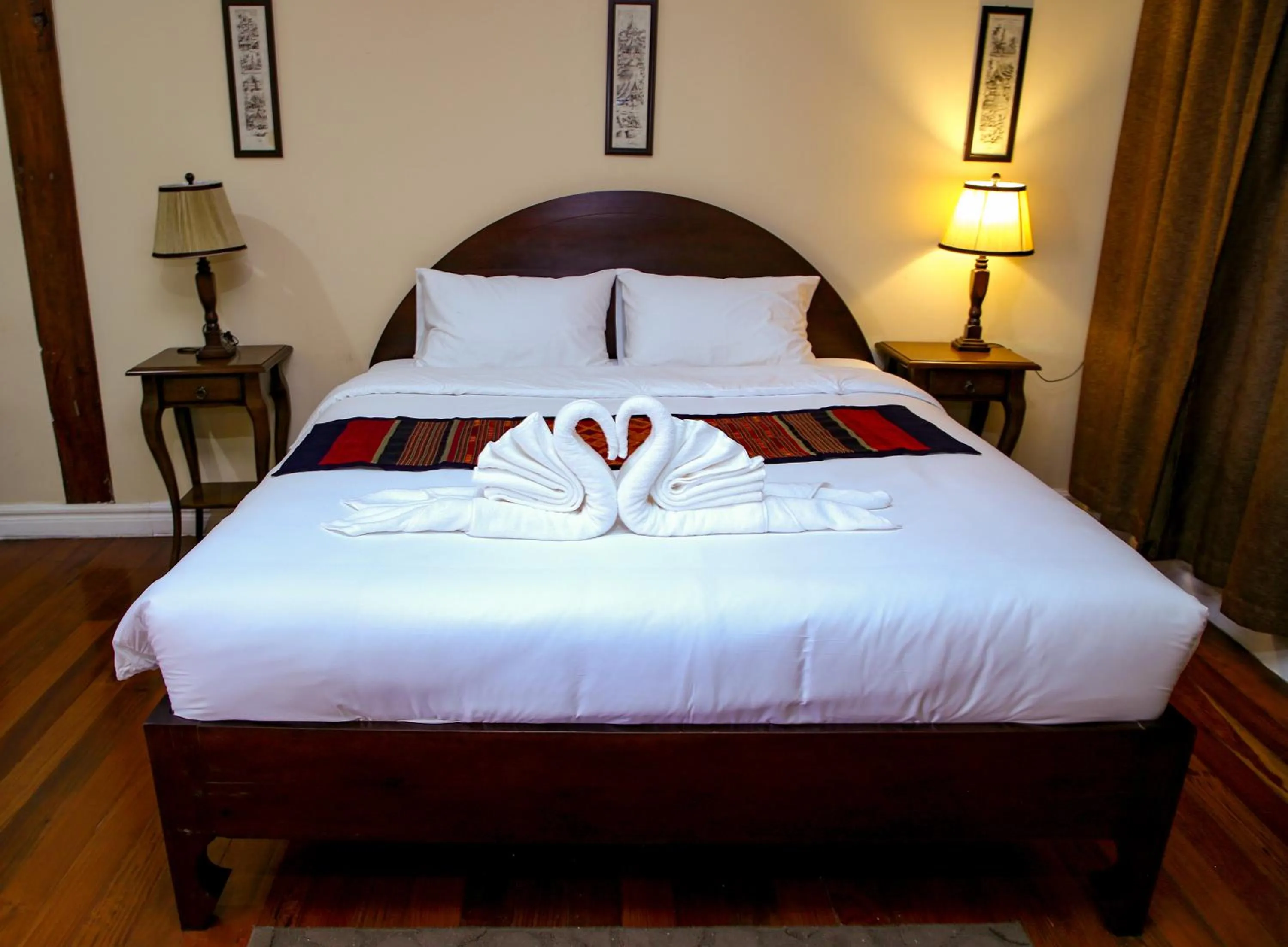 Bed in Le Luxe Boutique Hotel