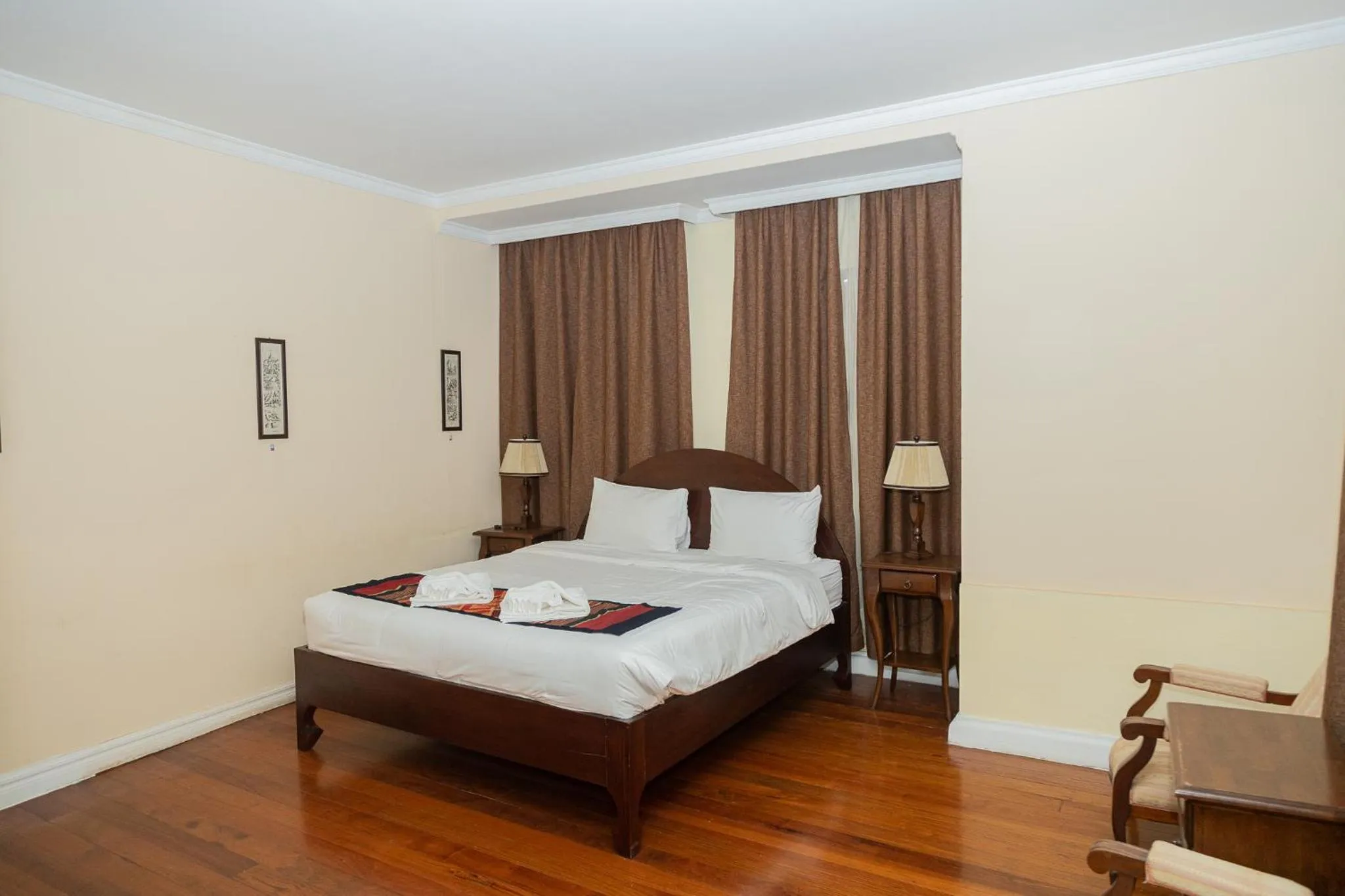 Bed in Le Luxe Boutique Hotel