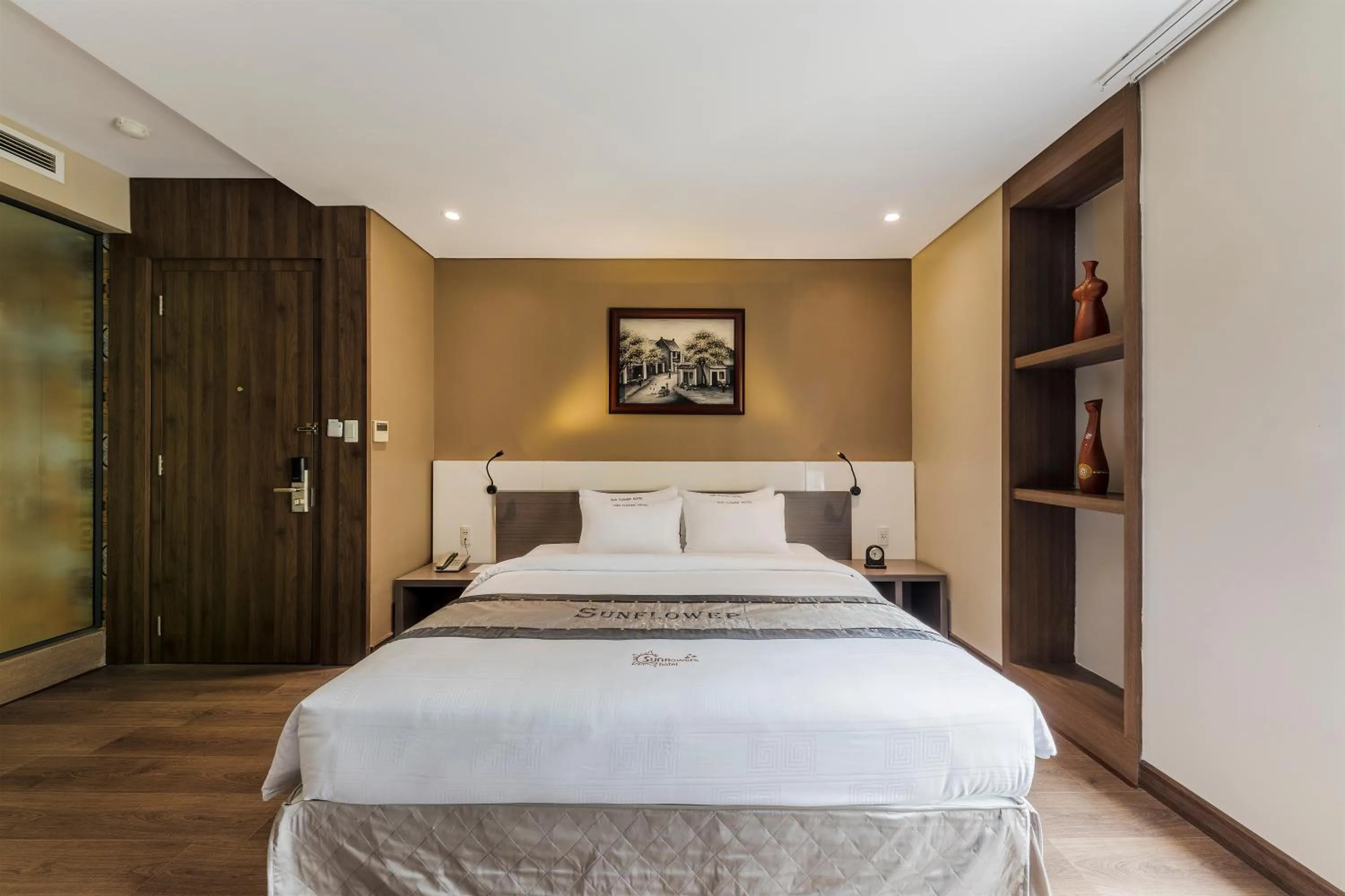 Bed in Sunflower Luxury Hotel