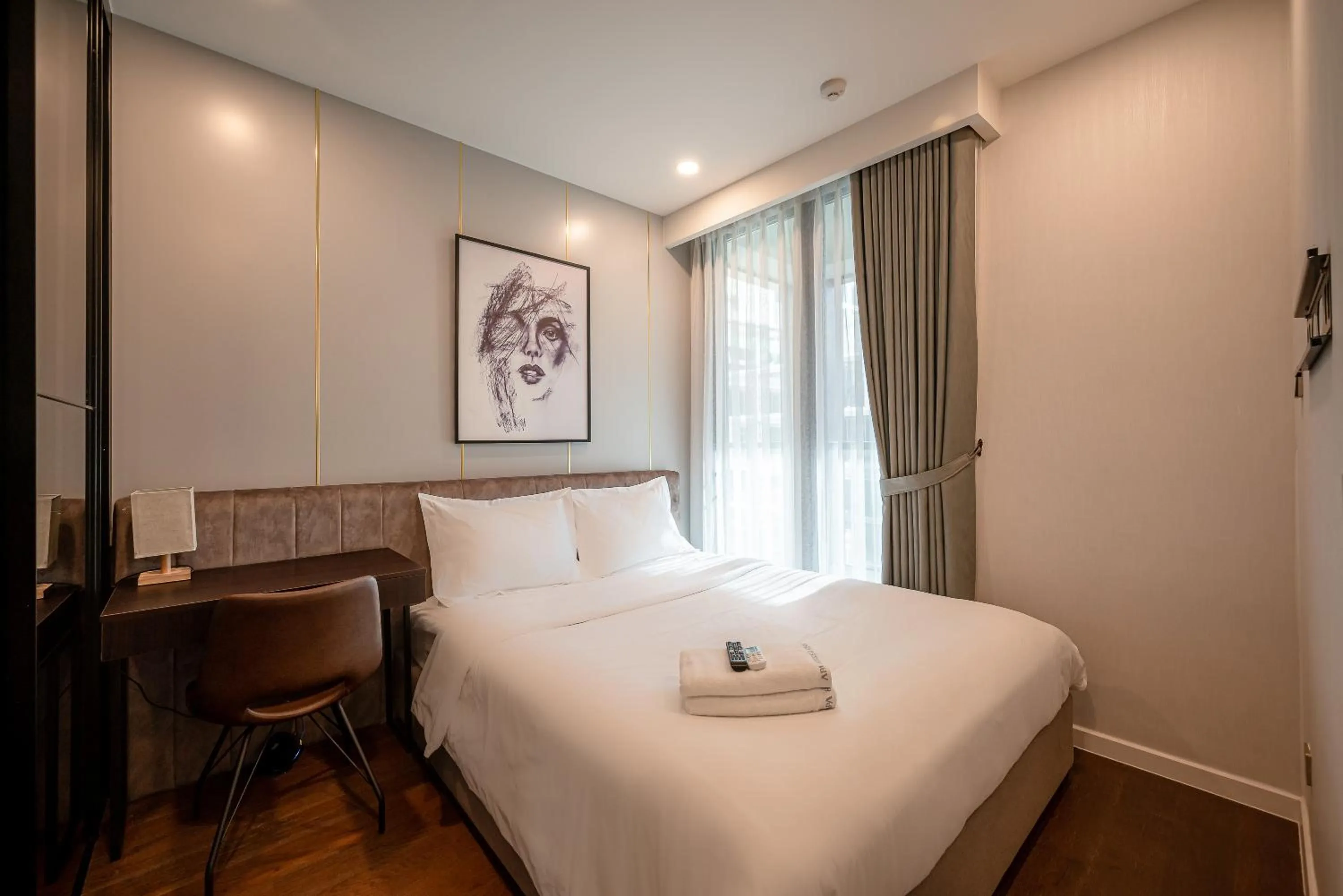 Bed in Metropole Thu Thiem Condo Apartment