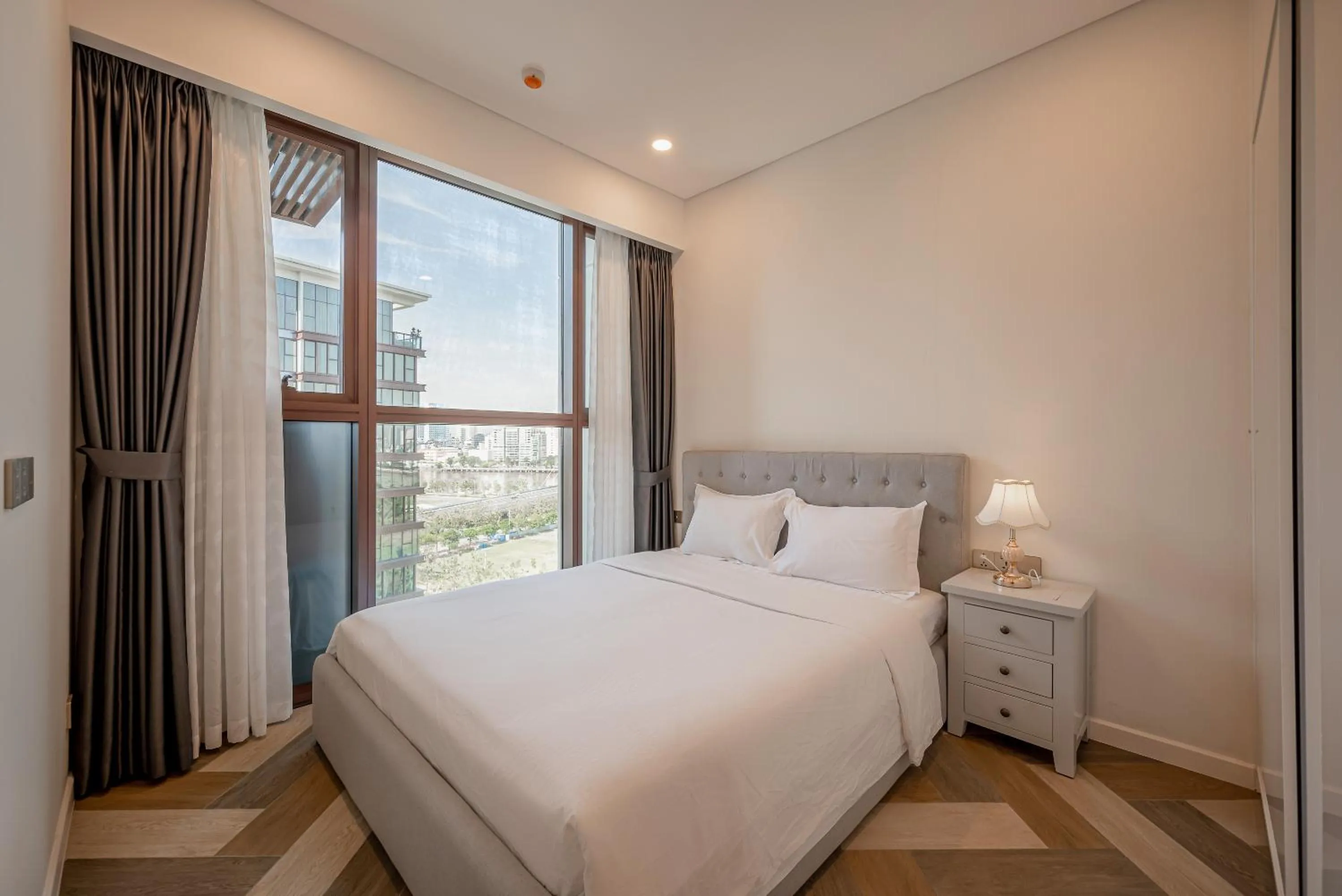 Bed in Metropole Thu Thiem Condo Apartment