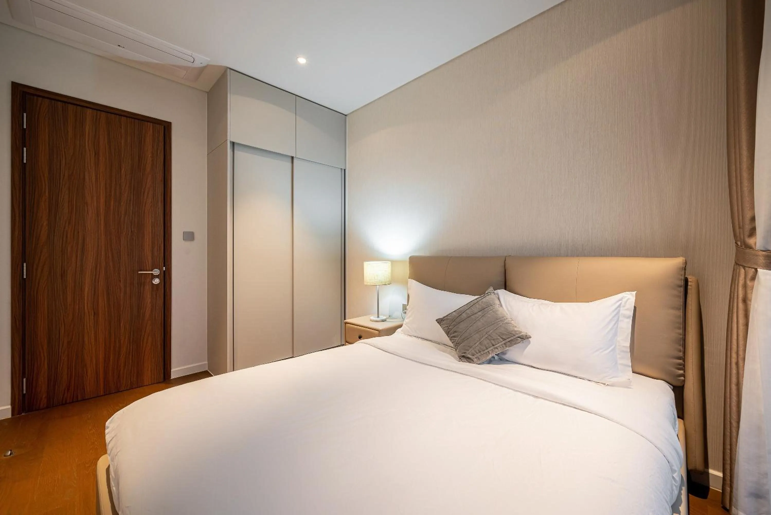 Bed in Metropole Thu Thiem Condo Apartment