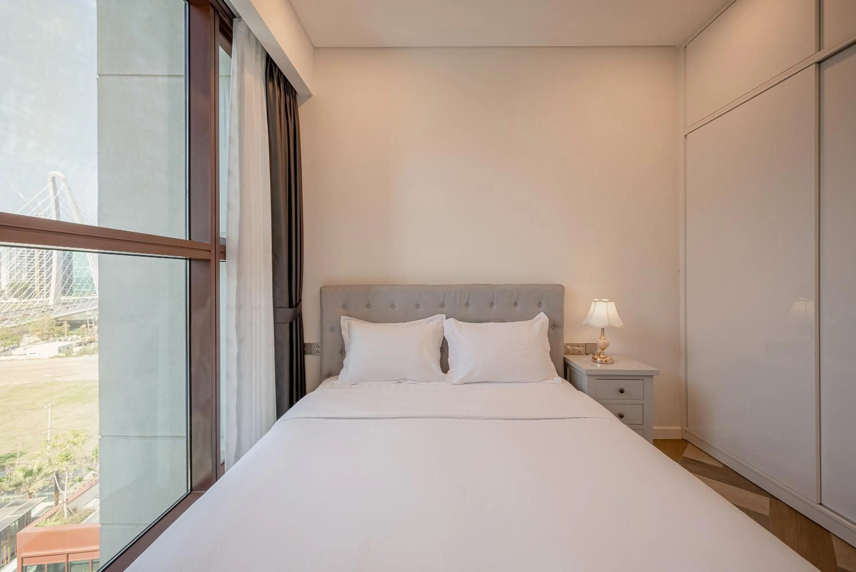 Bed in Metropole Thu Thiem Condo Apartment