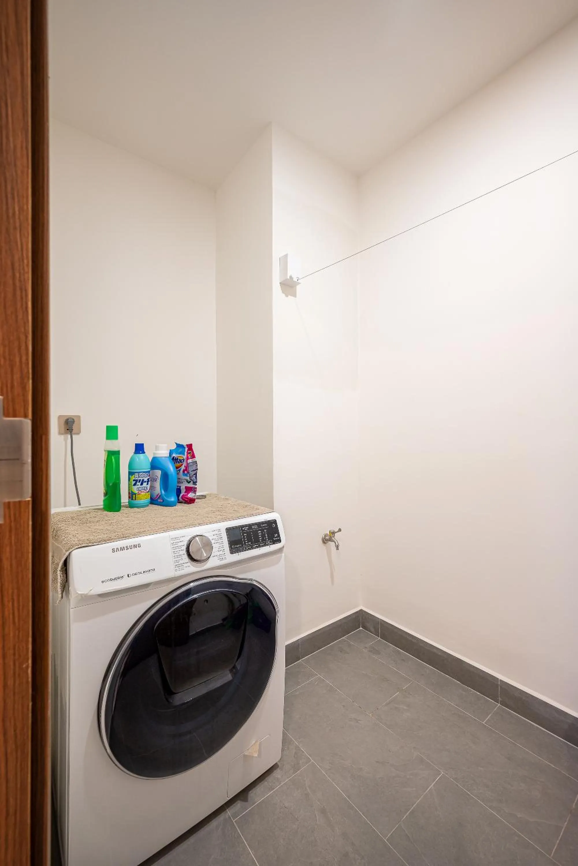 washing machine in Metropole Thu Thiem Condo Apartment