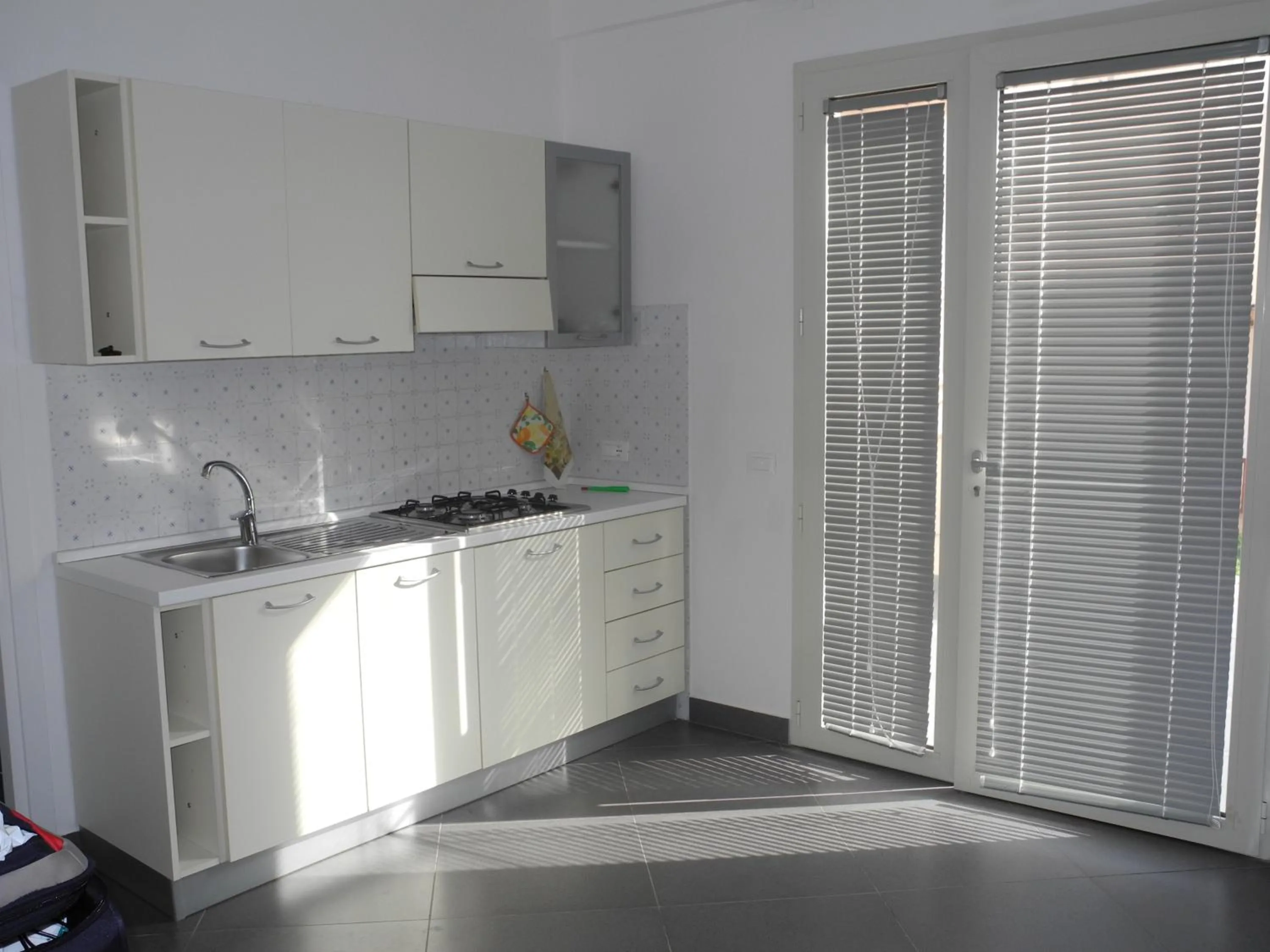 Kitchen or kitchenette in Calamaluk