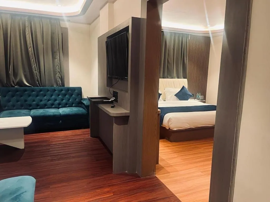 Bed in The Emerald Hotel & Siya Milan Banquets