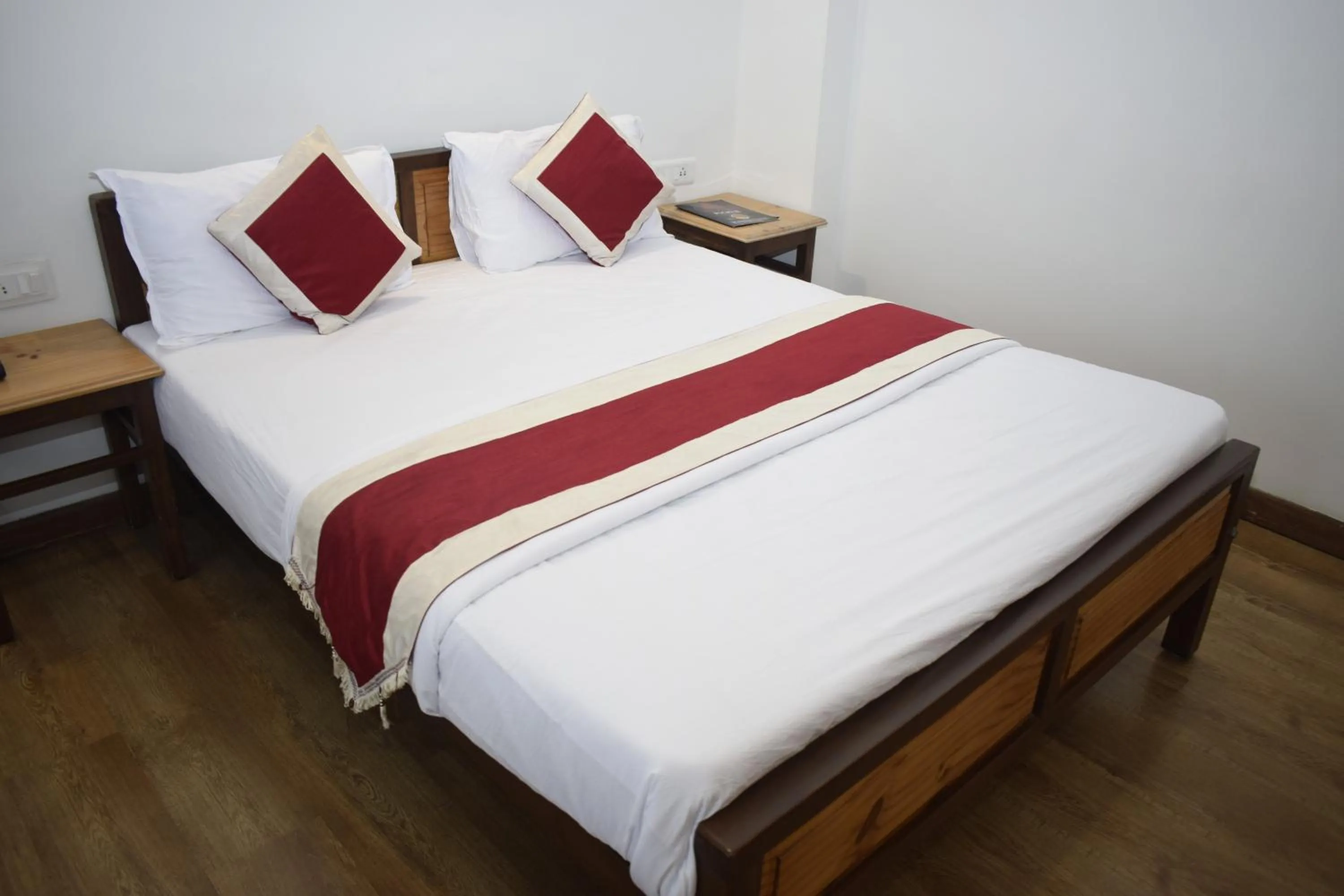 Bed in Altius Nest Hotel