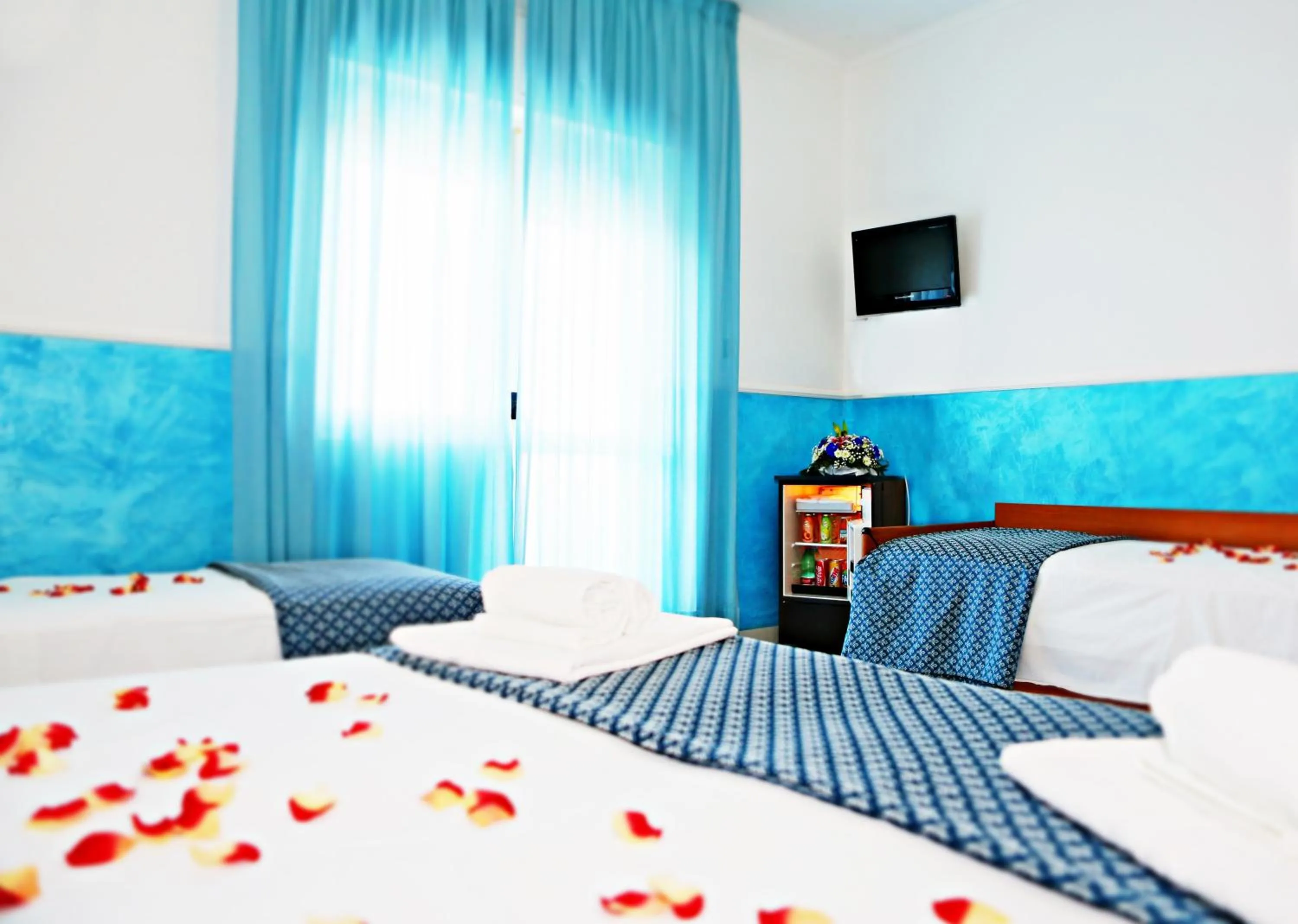 Bed in Hotel Blu Eden