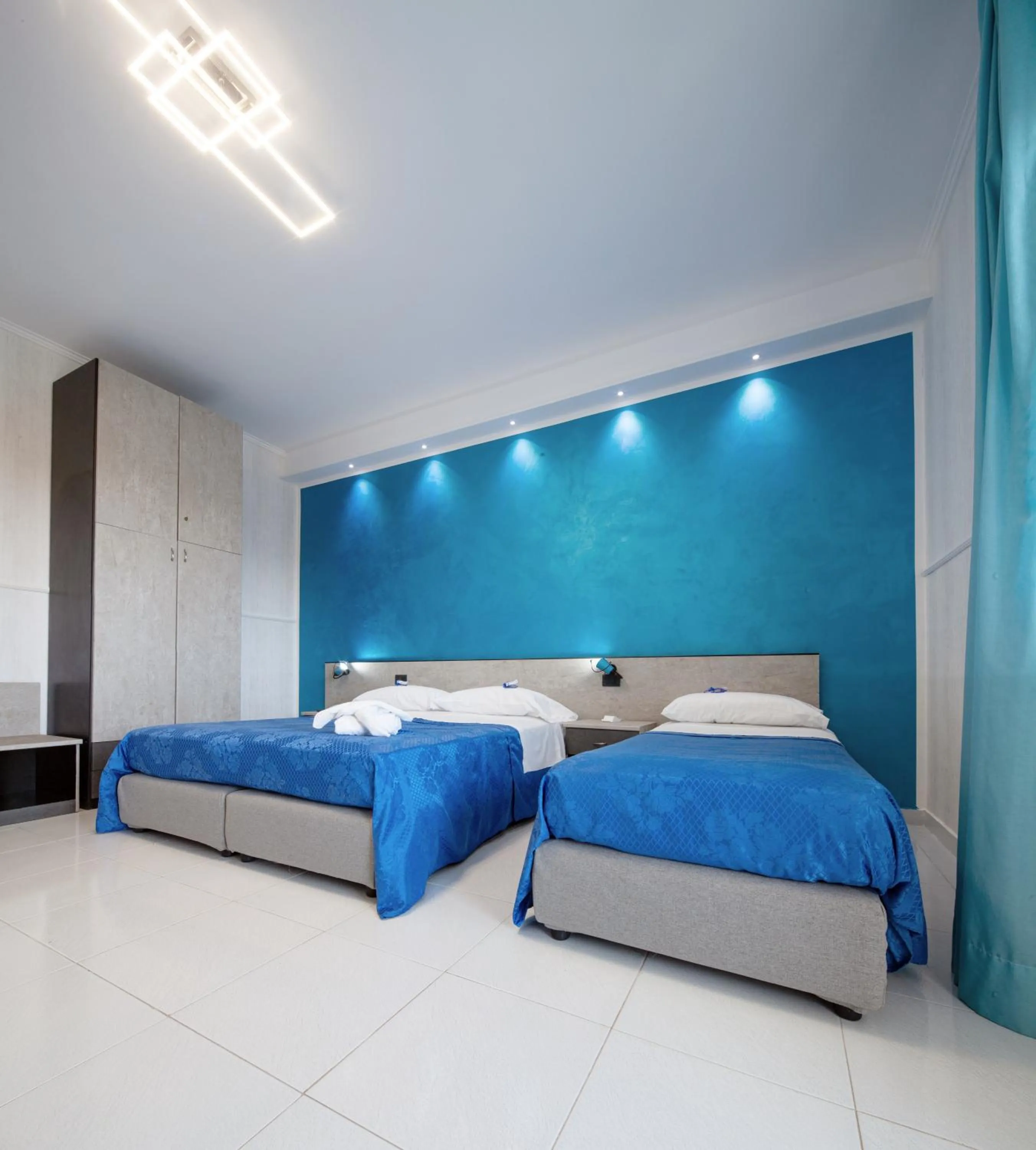 Bed in Hotel Blu Eden