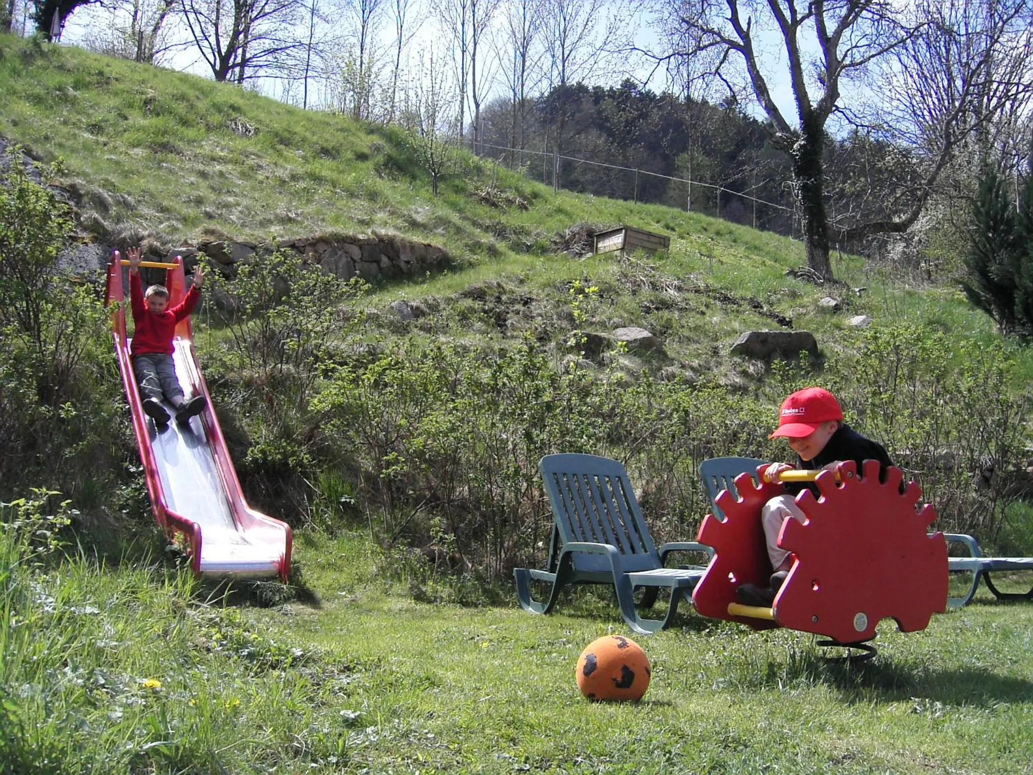 Children play ground in Logis Hôtel - Restaurant Aux Bruyères