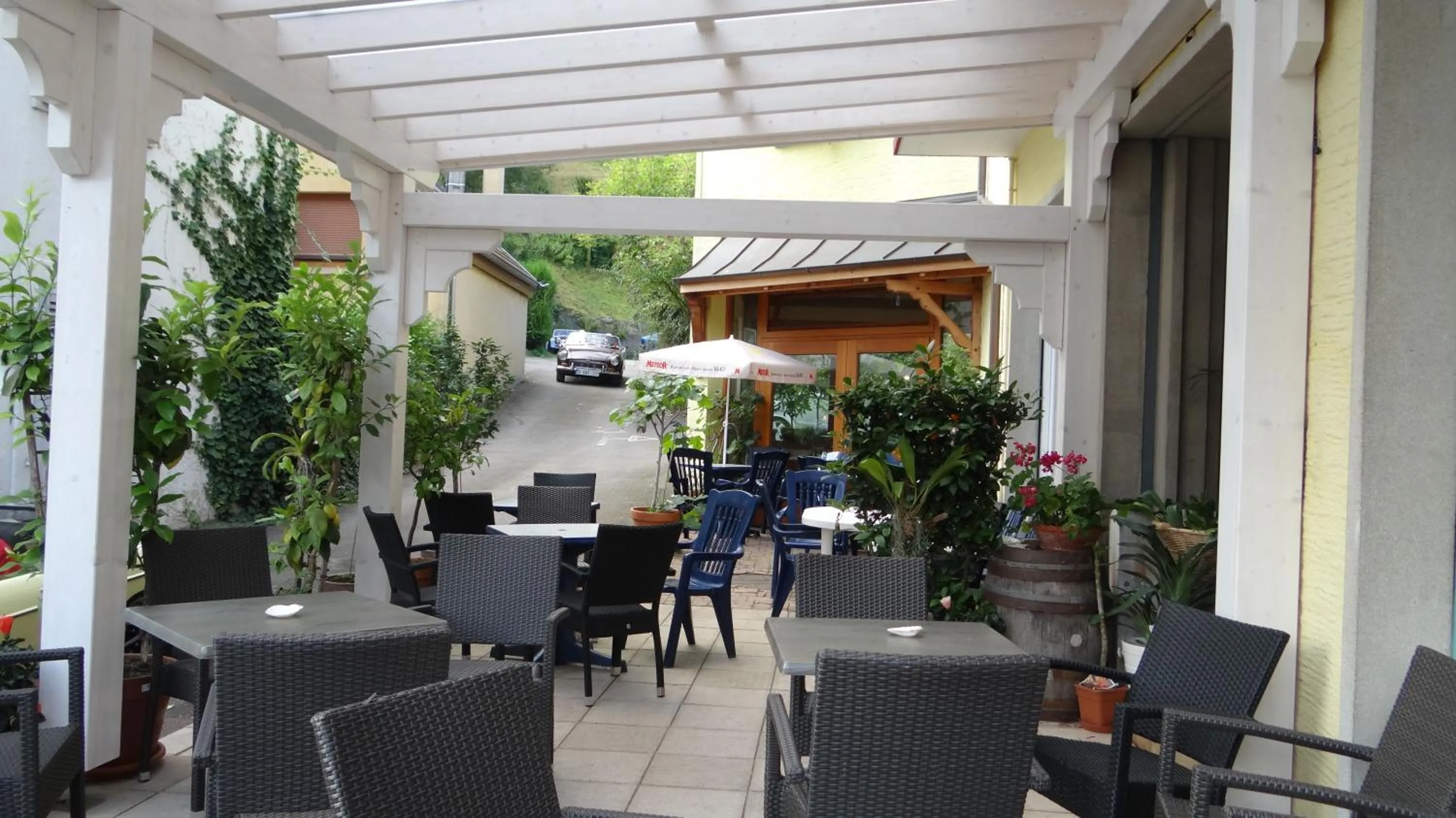Patio in Logis Hôtel - Restaurant Aux Bruyères