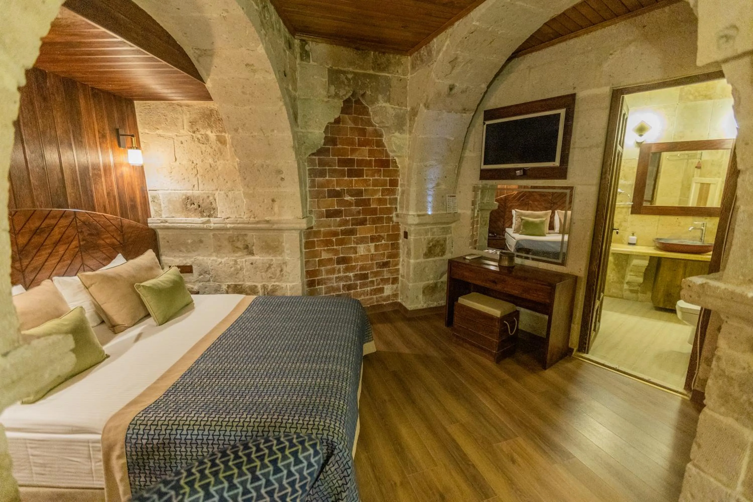 Photo of the whole room, Bed in Mimi Cappadocia Luxury Cave Hotel