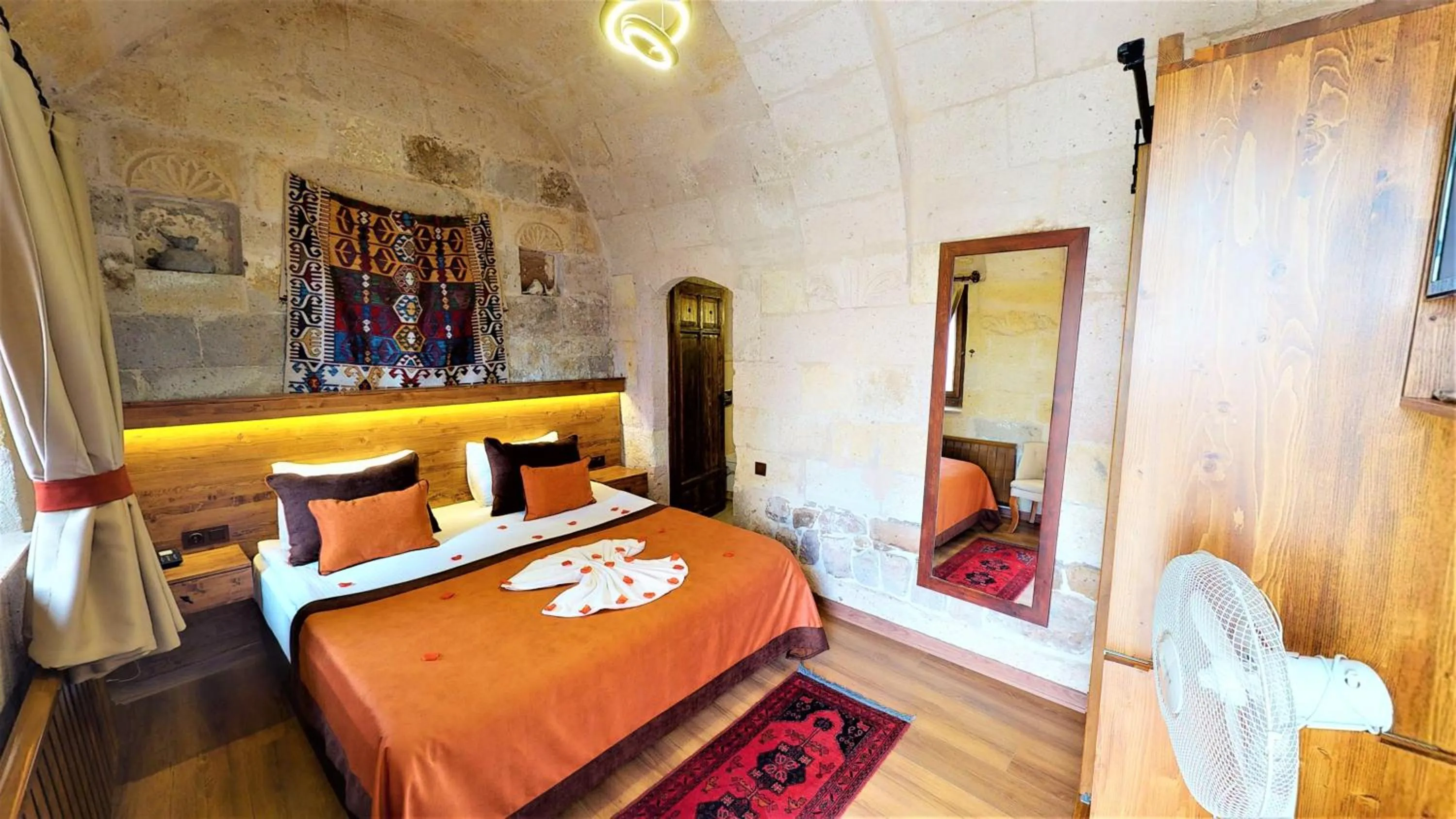 Photo of the whole room, Bed in Mimi Cappadocia Luxury Cave Hotel