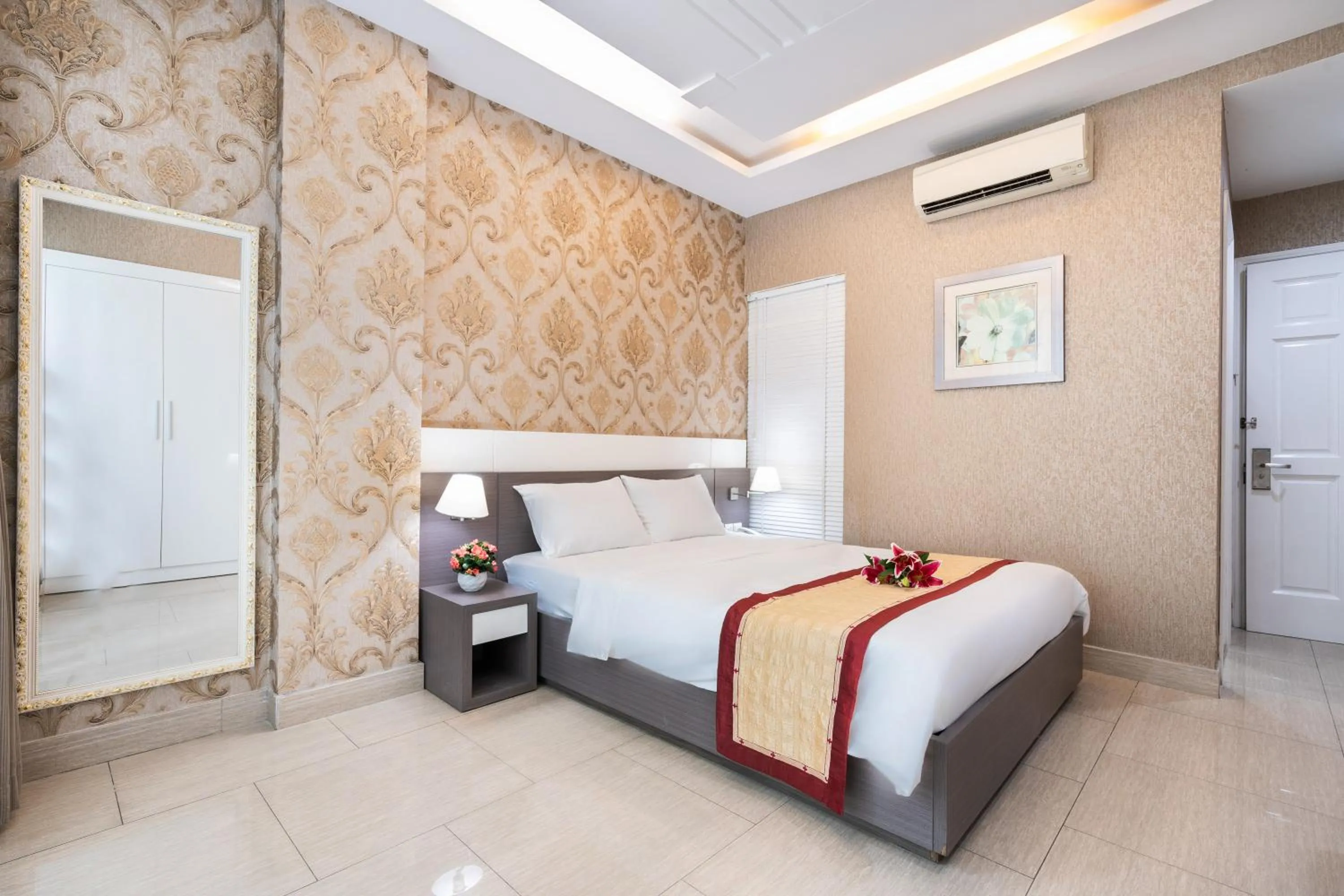 Bed in EEA Central Saigon Hotel