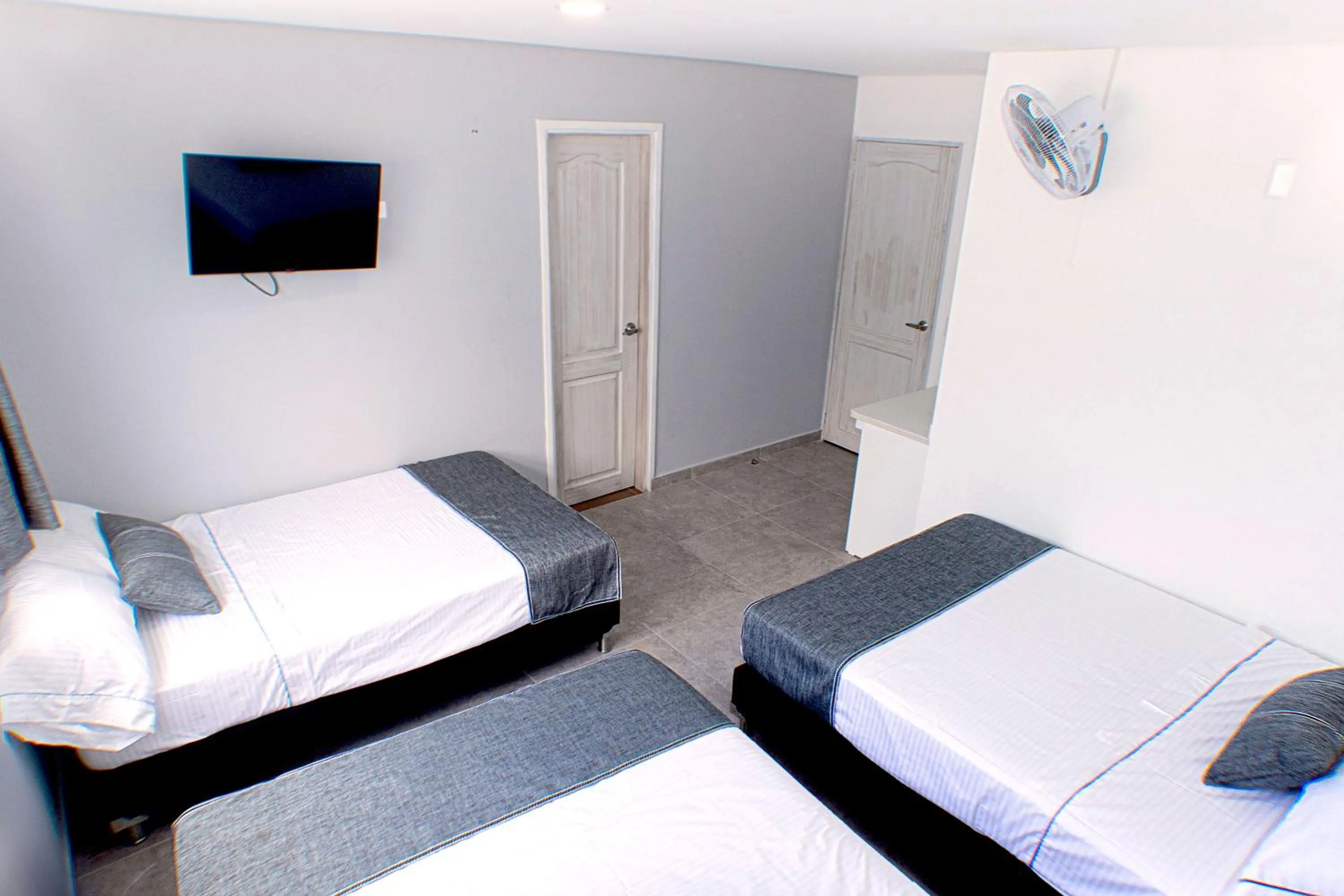 Bed in El Oscar Hotel