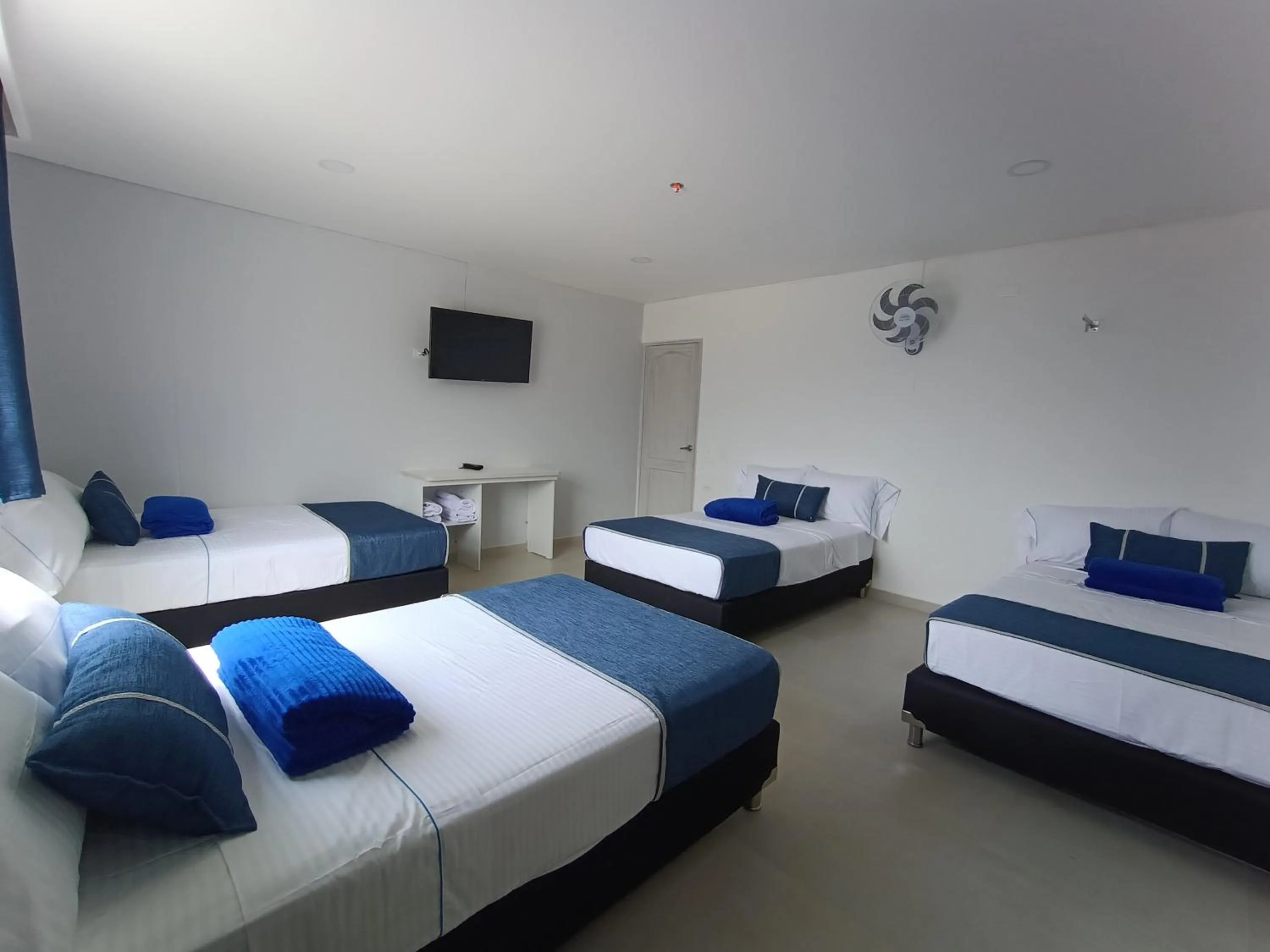 Quadruple Room in El Oscar Hotel