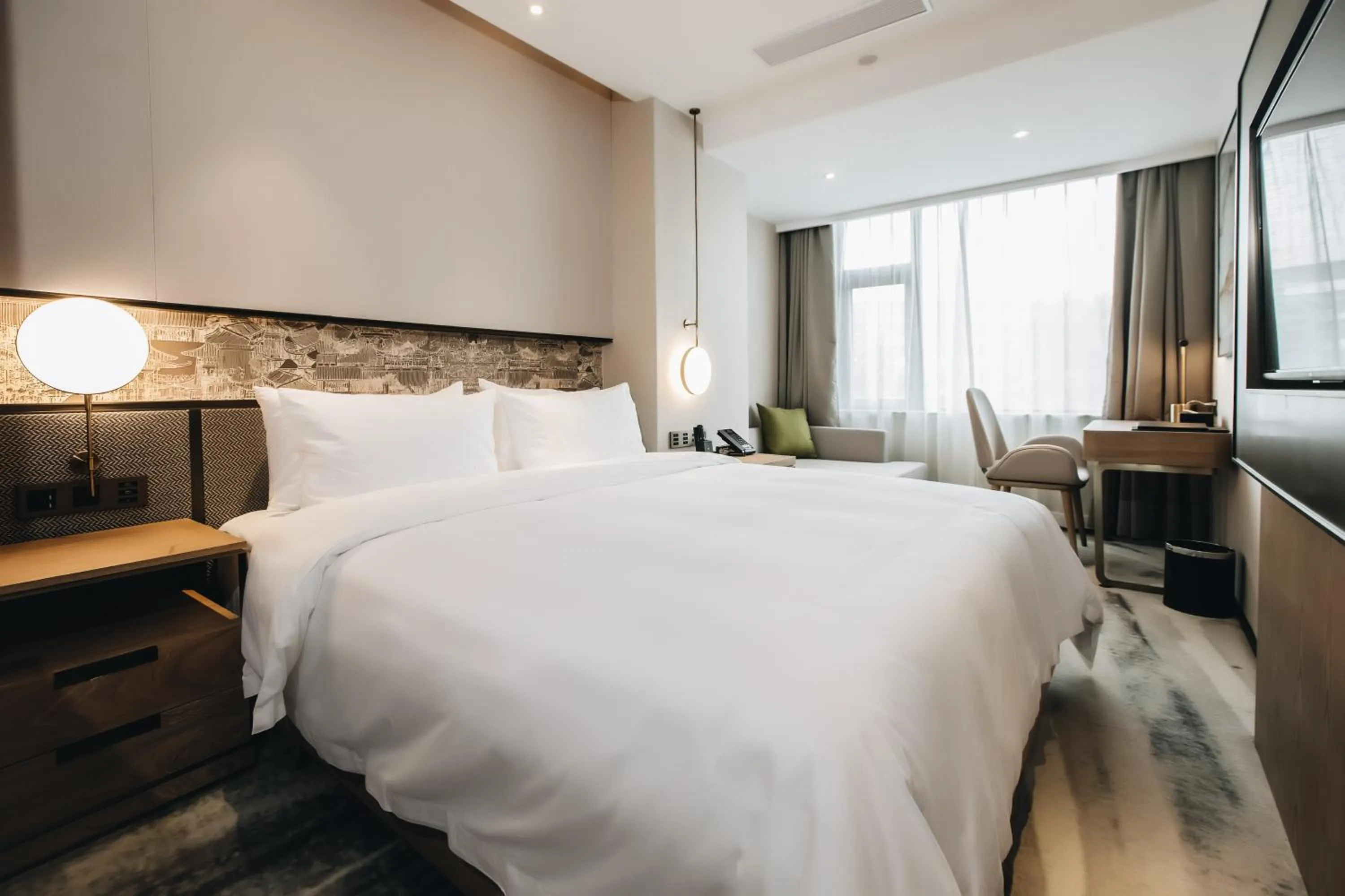 Photo of the whole room, Bed in Orienwit Hotel-Free Shuttle Bus fir Canton Fair