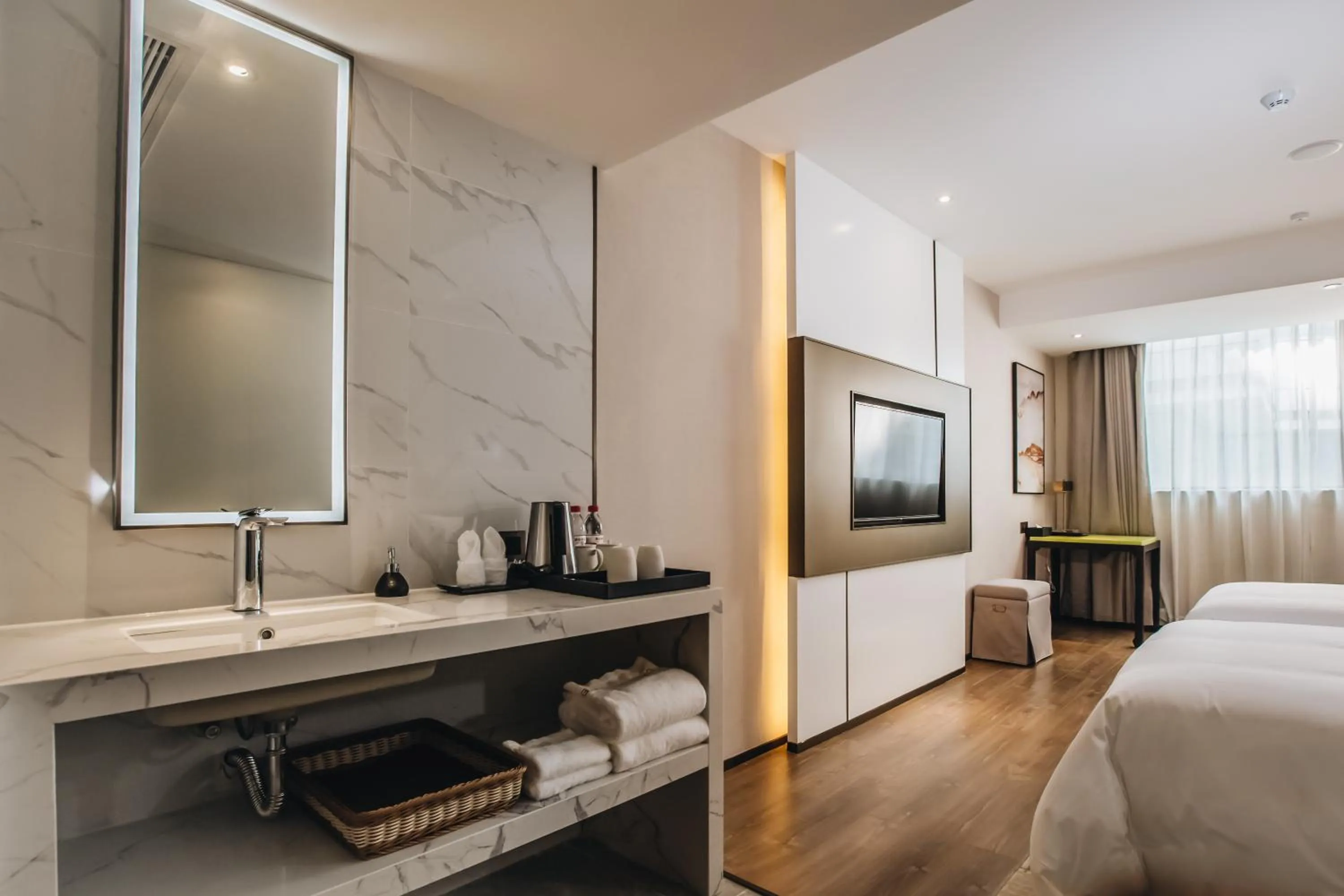 Photo of the whole room, Bed in Orienwit Hotel-Free Shuttle Bus fir Canton Fair