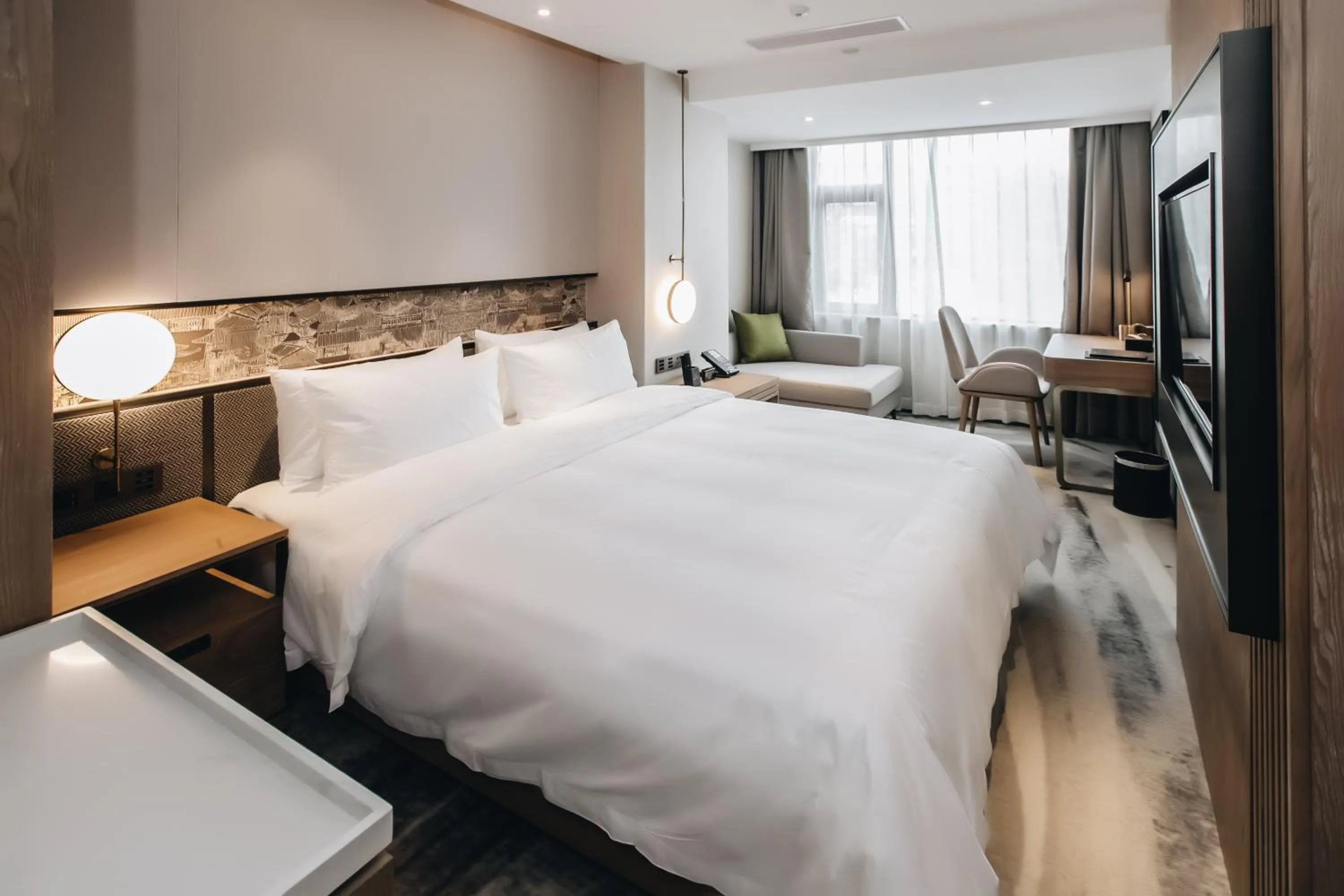 Photo of the whole room, Bed in Orienwit Hotel-Free Shuttle Bus fir Canton Fair