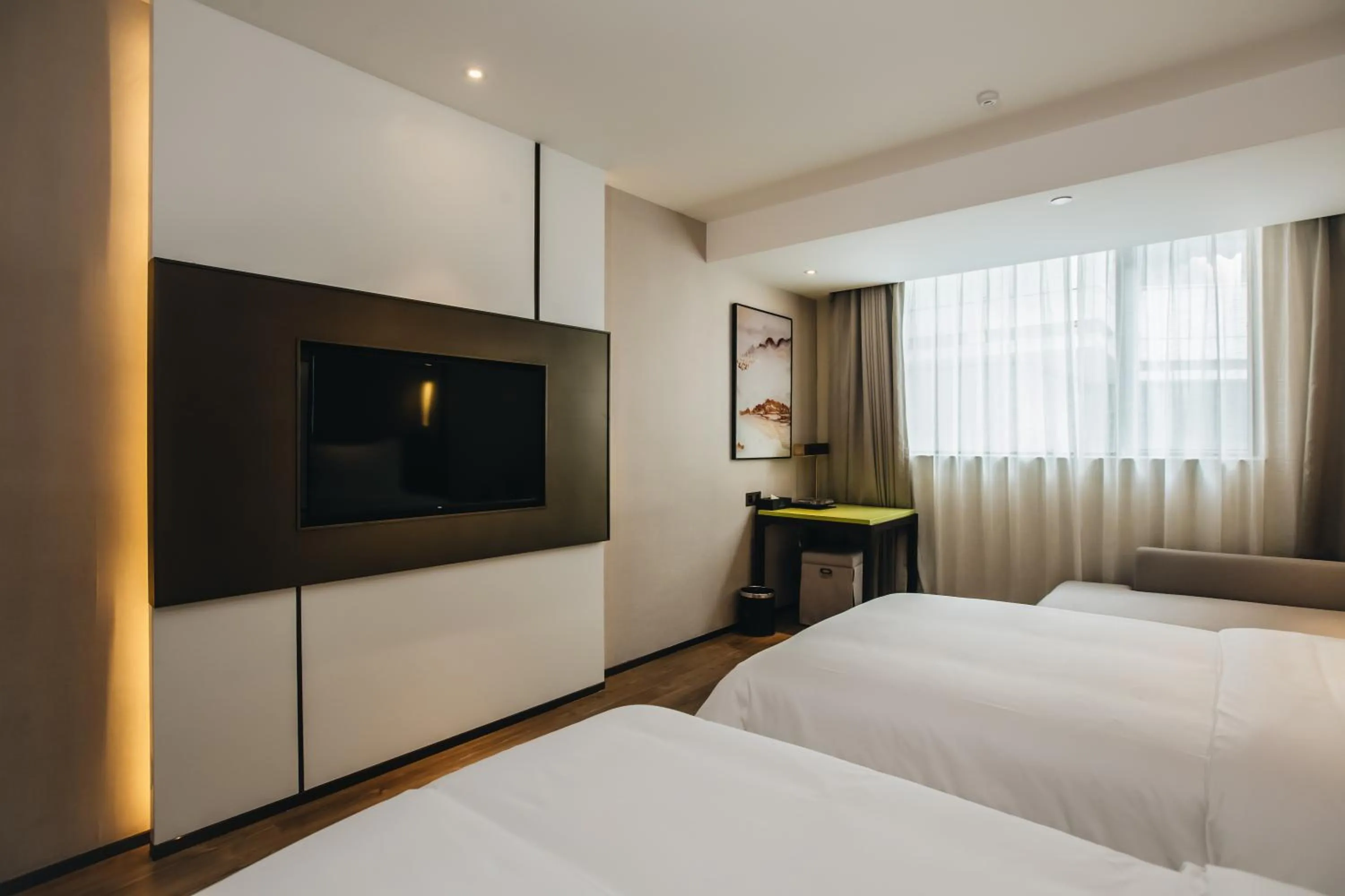 Photo of the whole room, Bed in Orienwit Hotel-Free Shuttle Bus fir Canton Fair