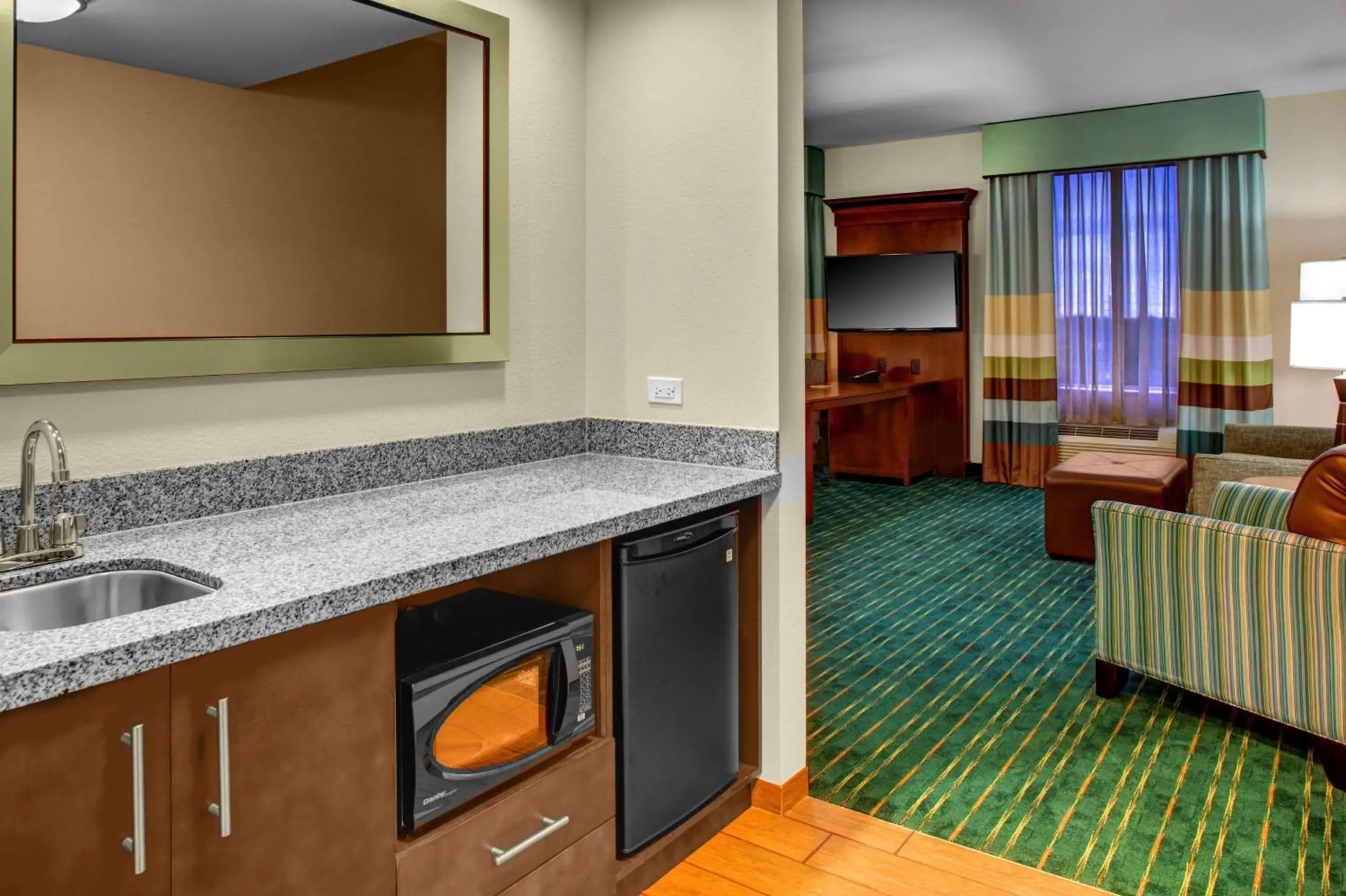 Living room in Hampton Inn and Suites Coconut Creek Living room in Hampton Inn and Suites Coconut Creek