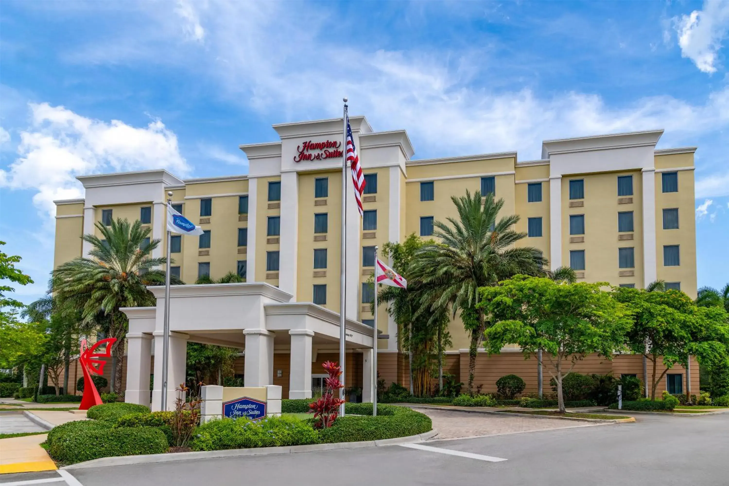 Property building in Hampton Inn and Suites Coconut Creek Property building in Hampton Inn and Suites Coconut Creek