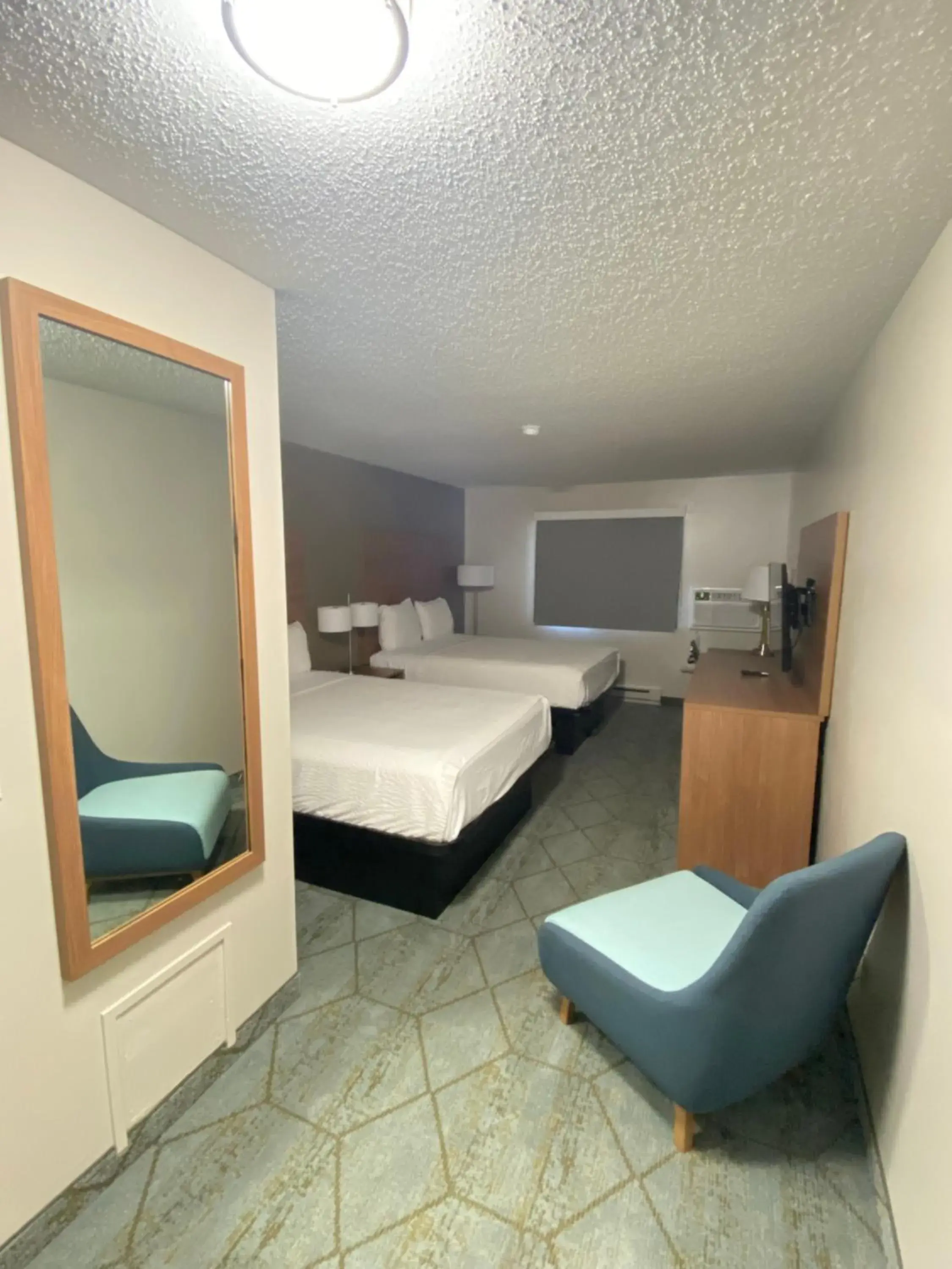 Bed in Super 8 by Wyndham Oshkosh Airport Bed in Super 8 by Wyndham Oshkosh Airport