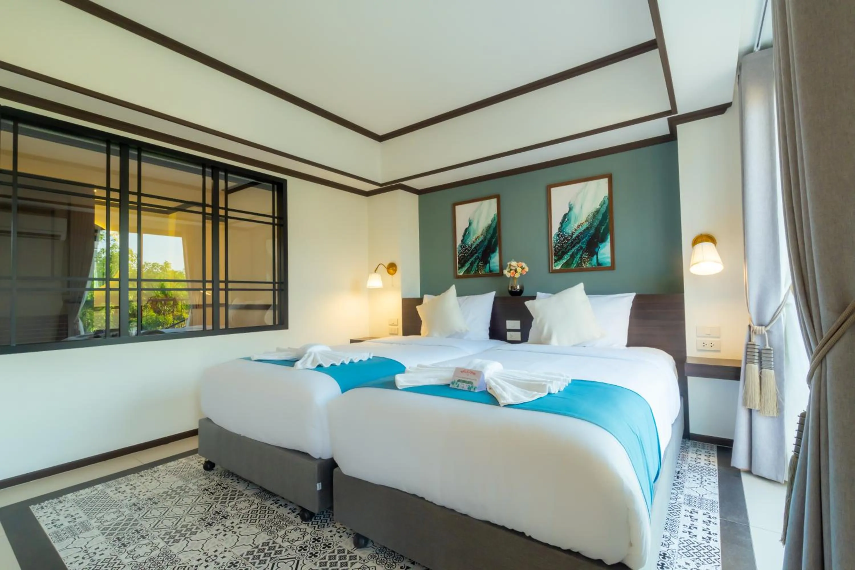 Bed in Le ville lanna Chiang Mai Gate Old Town Hotel