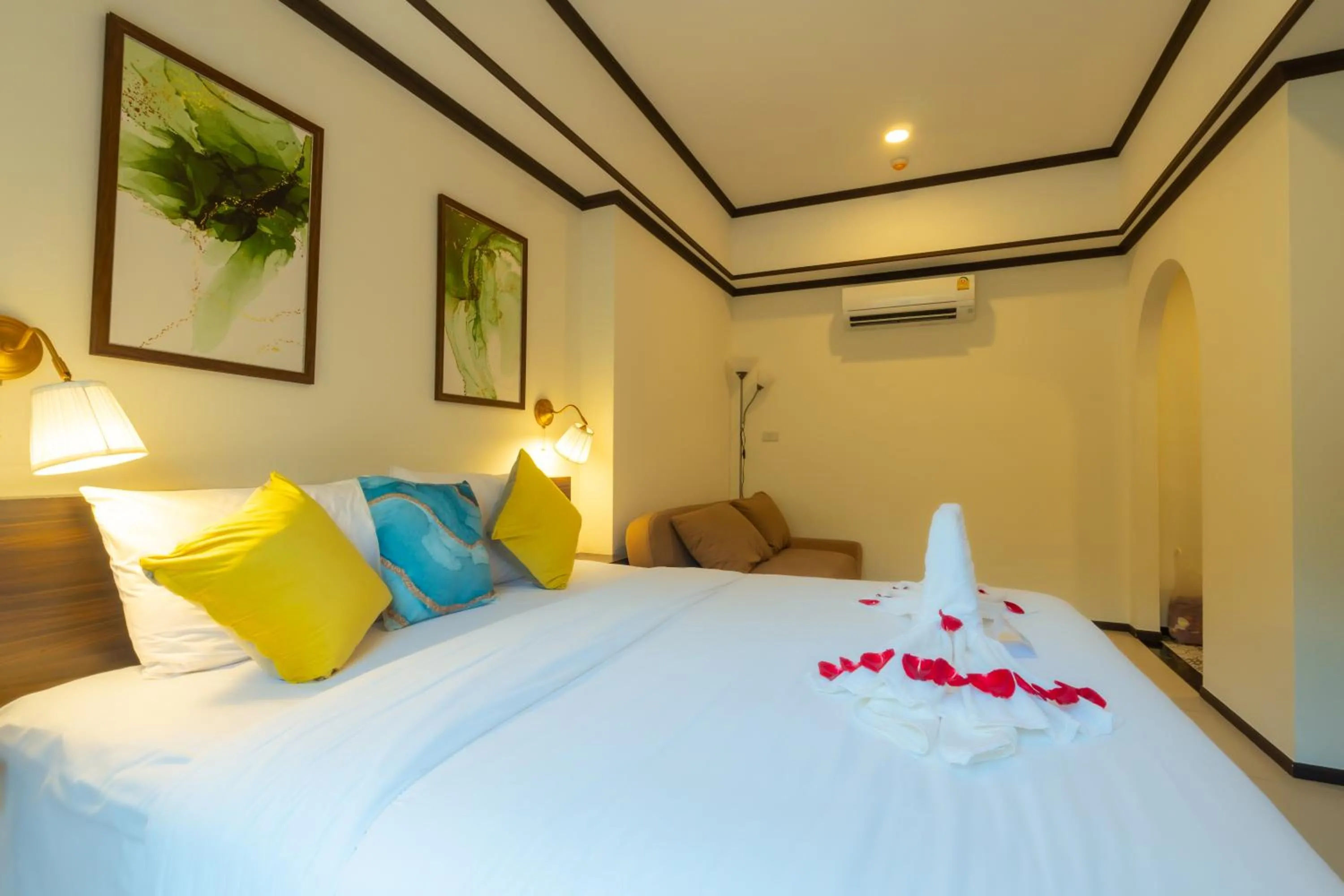 Bed in Le ville lanna Chiang Mai Gate Old Town Hotel