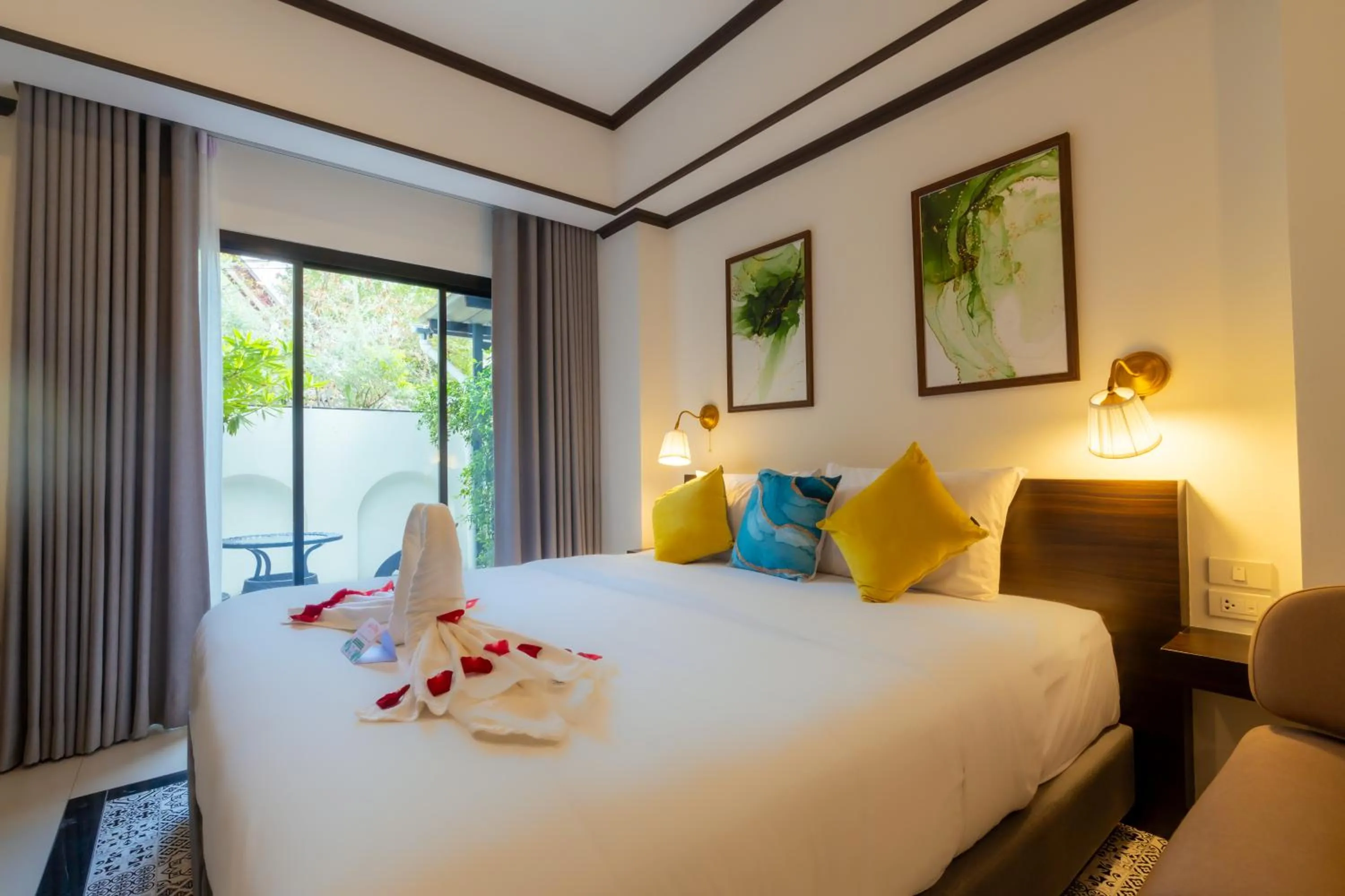 Bed in Le ville lanna Chiang Mai Gate Old Town Hotel