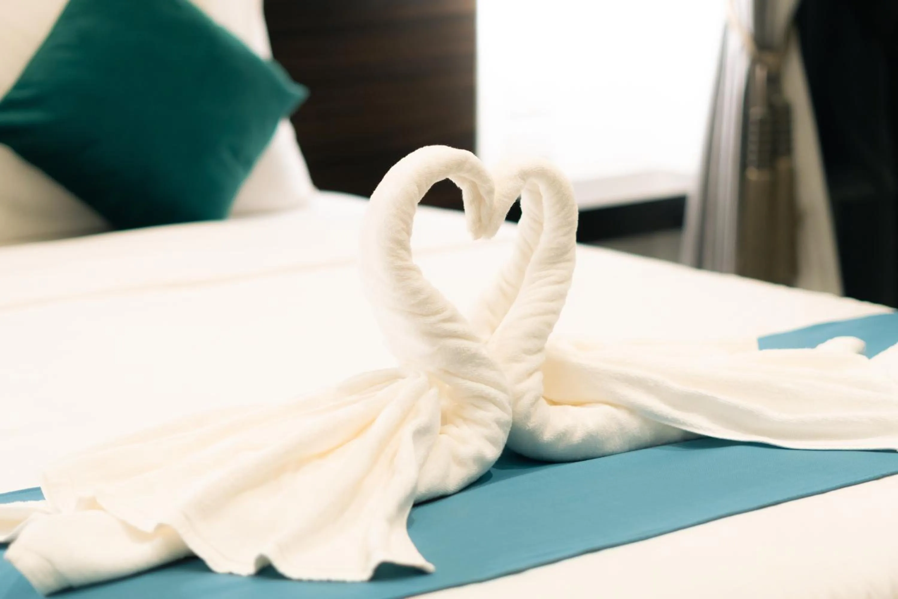 Bed in Le ville lanna Chiang Mai Gate Old Town Hotel